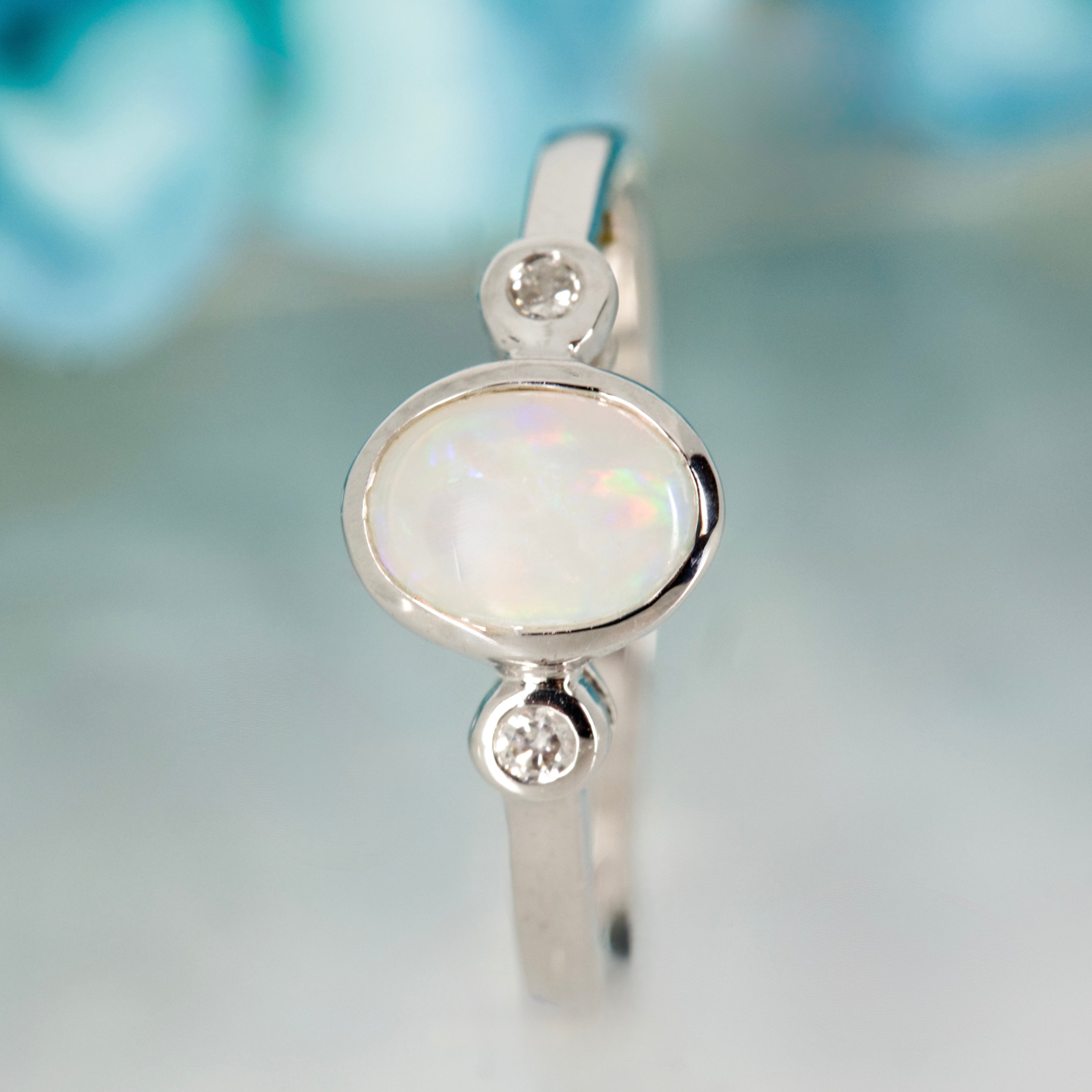 9ct White Gold Oval Opal & Round Brilliant Cut Diamond Trilogy Ring