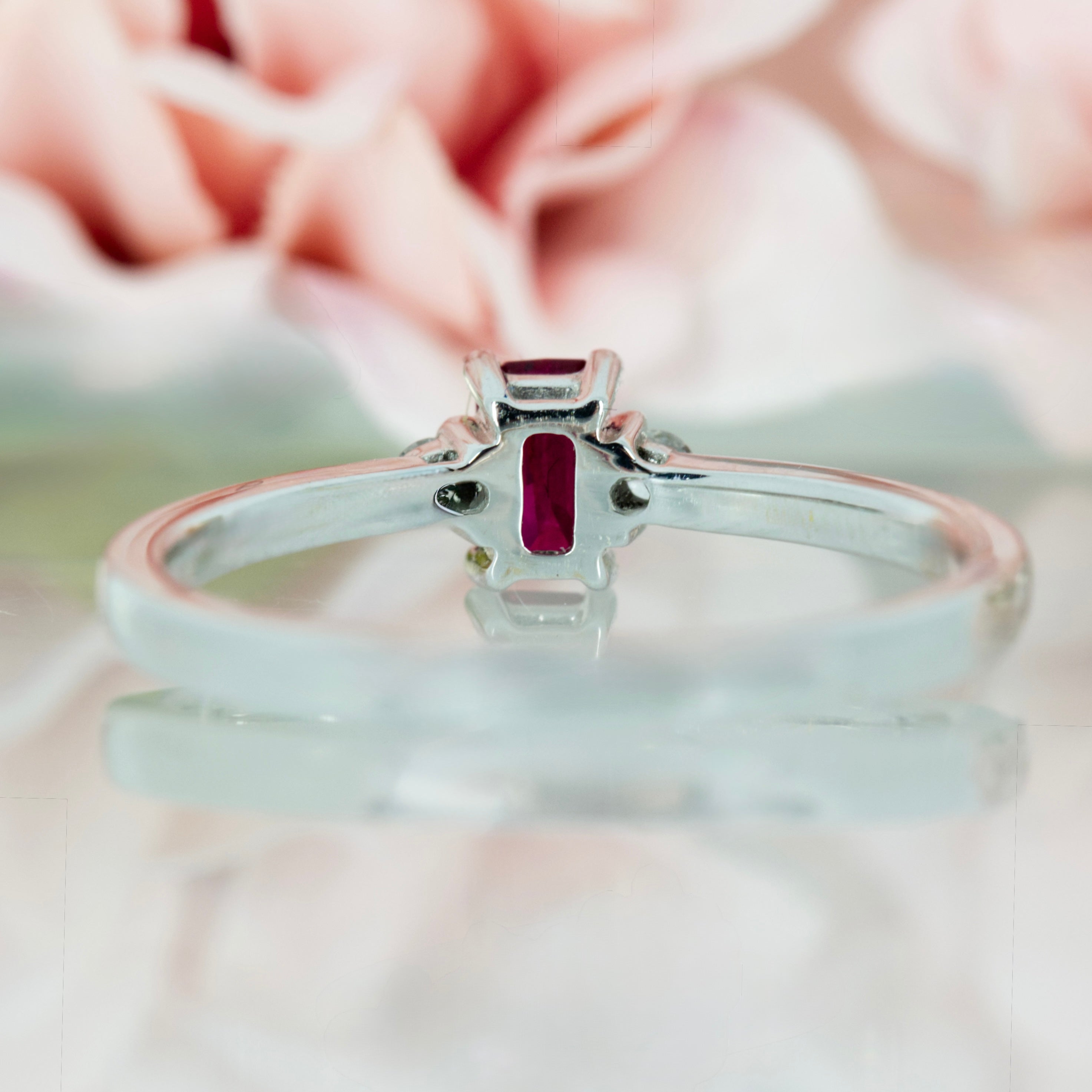 18ct White Gold Octagonal Cut Ruby & Round Brilliant Cut Diamond Trilogy Ring