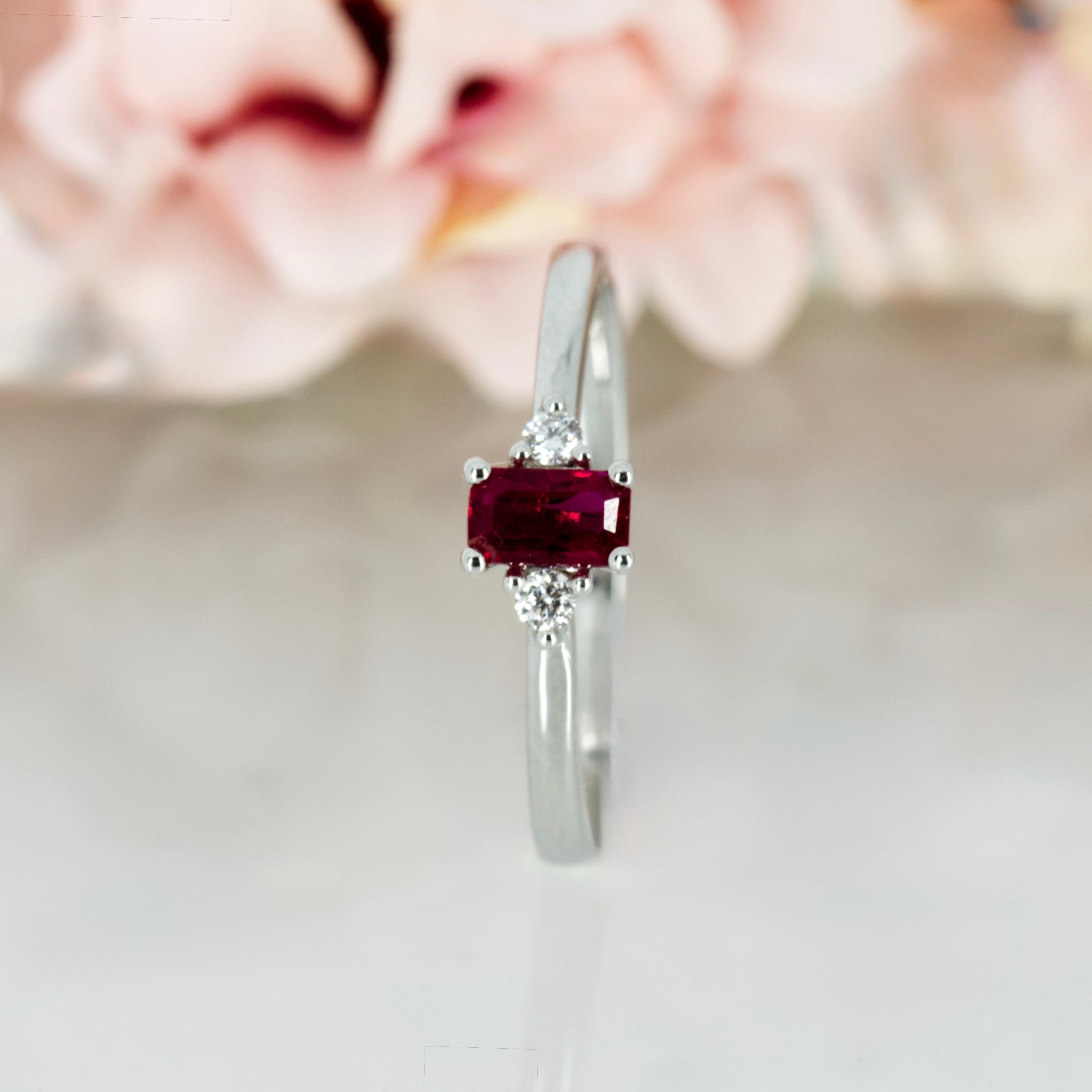 18ct White Gold Octagonal Cut Ruby & Round Brilliant Cut Diamond Trilogy Ring