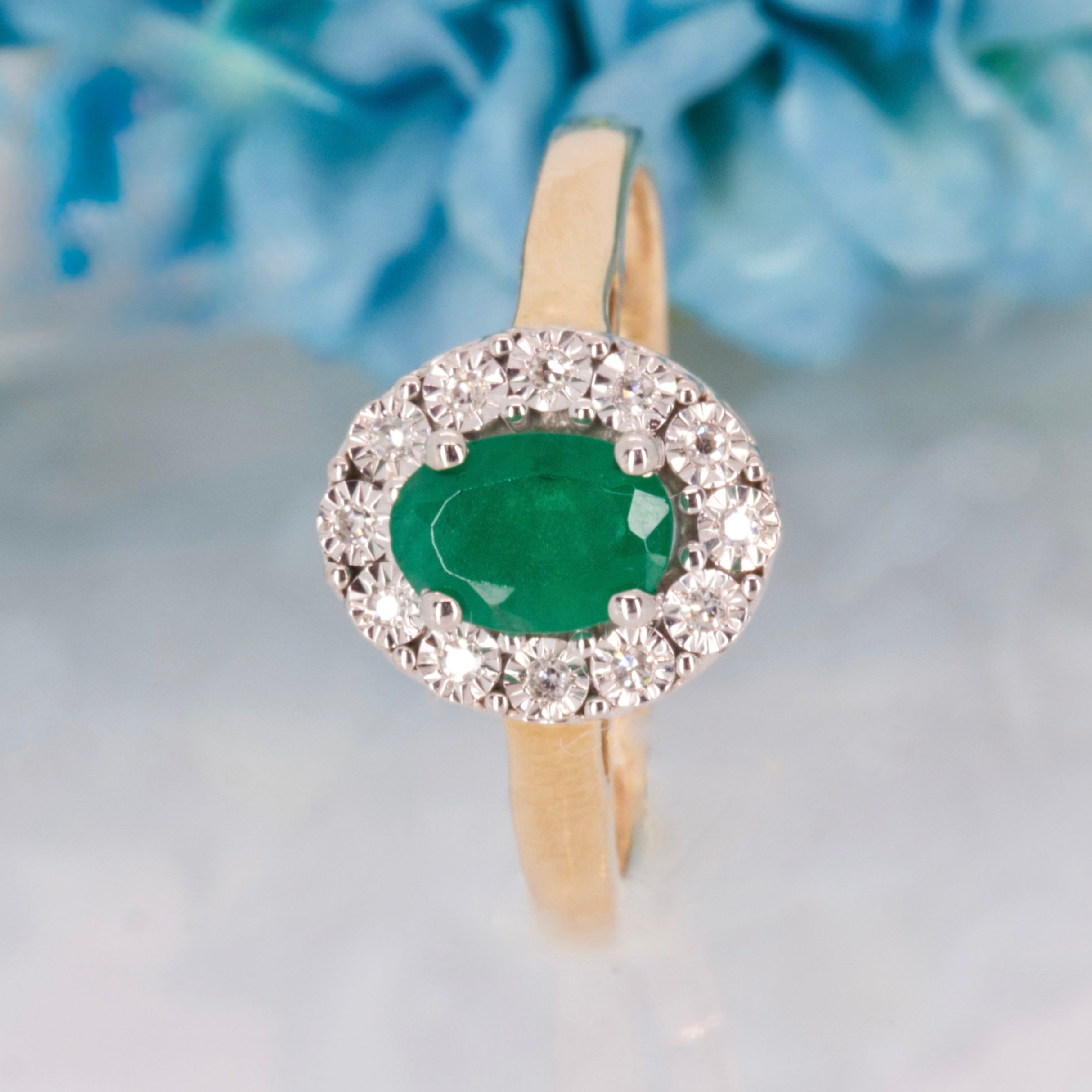 9ct Yellow Gold Oval Cut Emerald & Round Brilliant Cut Diamond Halo Cluster Ring