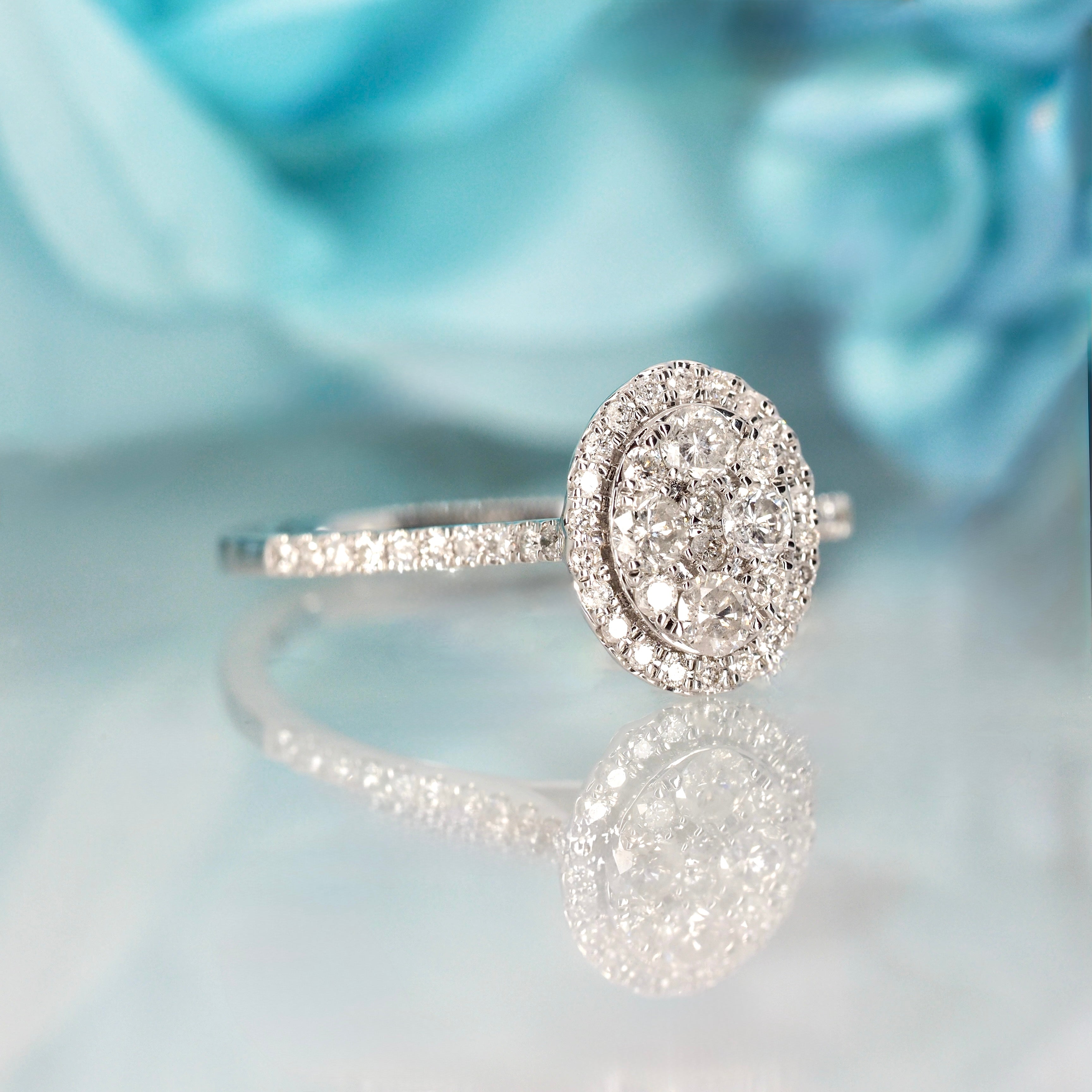 9ct White Gold 0.55ct Round Brilliant Cut Diamond Oval Cluster Ring