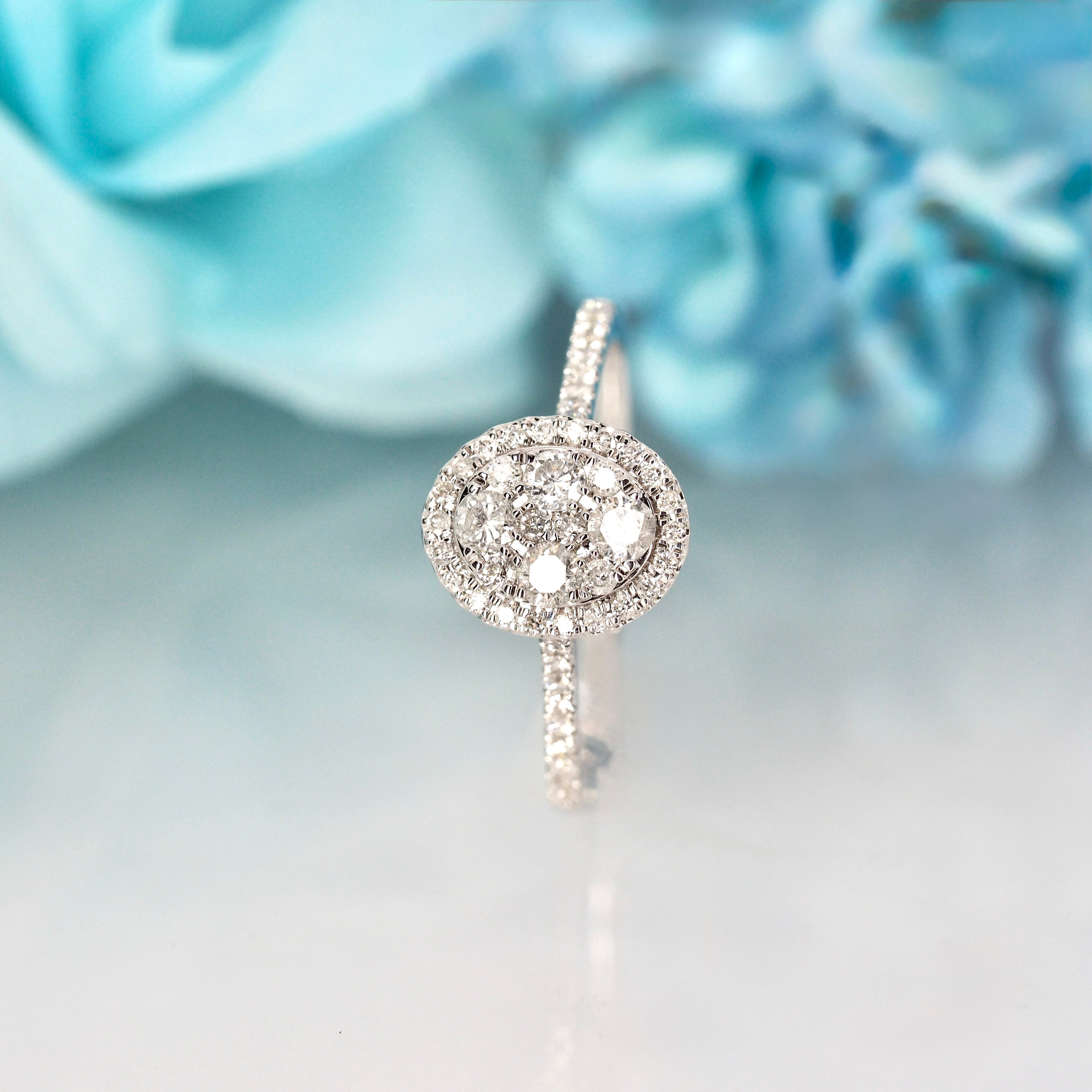 9ct White Gold 0.55ct Round Brilliant Cut Diamond Oval Cluster Ring