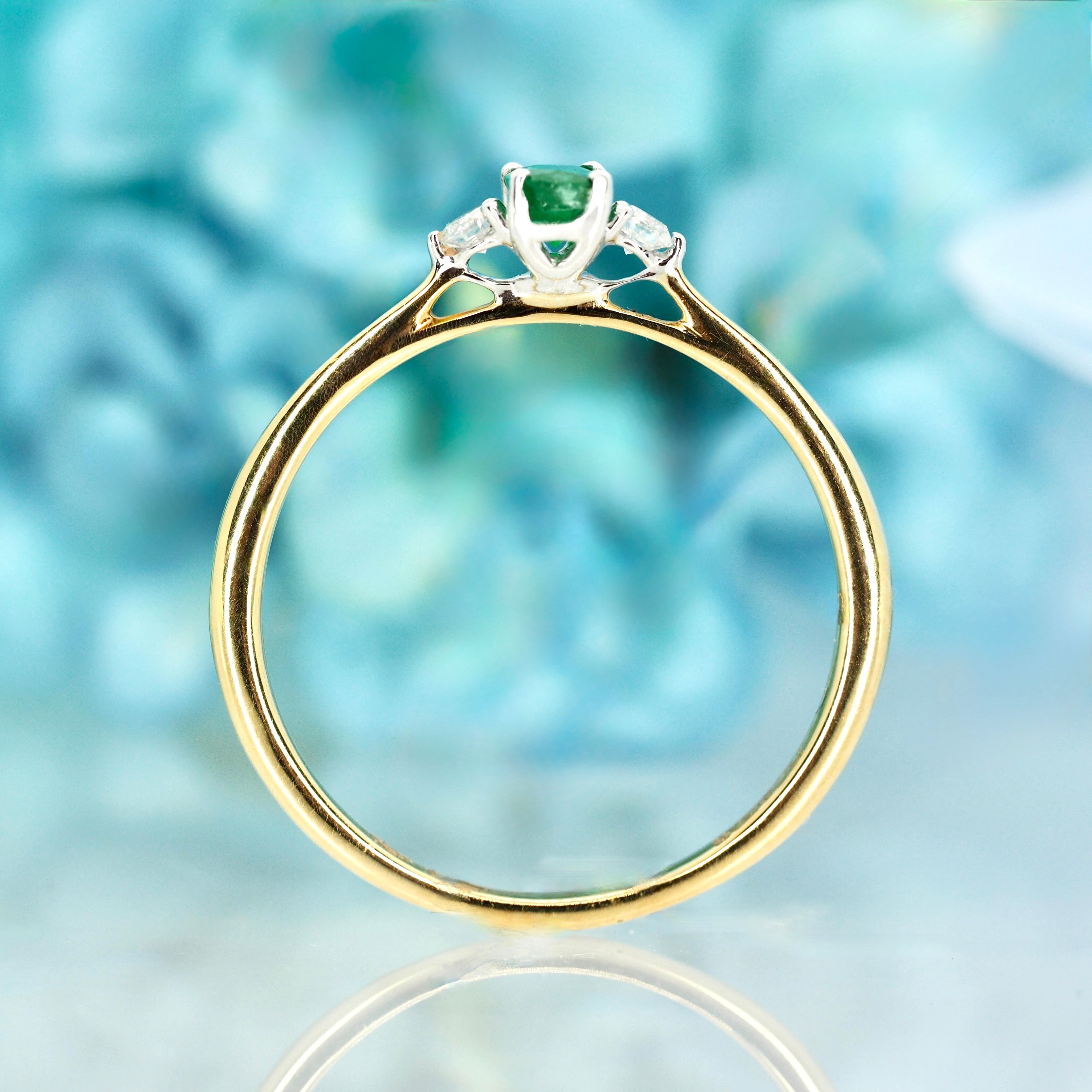 9ct Yellow Gold Oval Cut Emerald & Round Brilliant Cut Diamond Trilogy Ring
