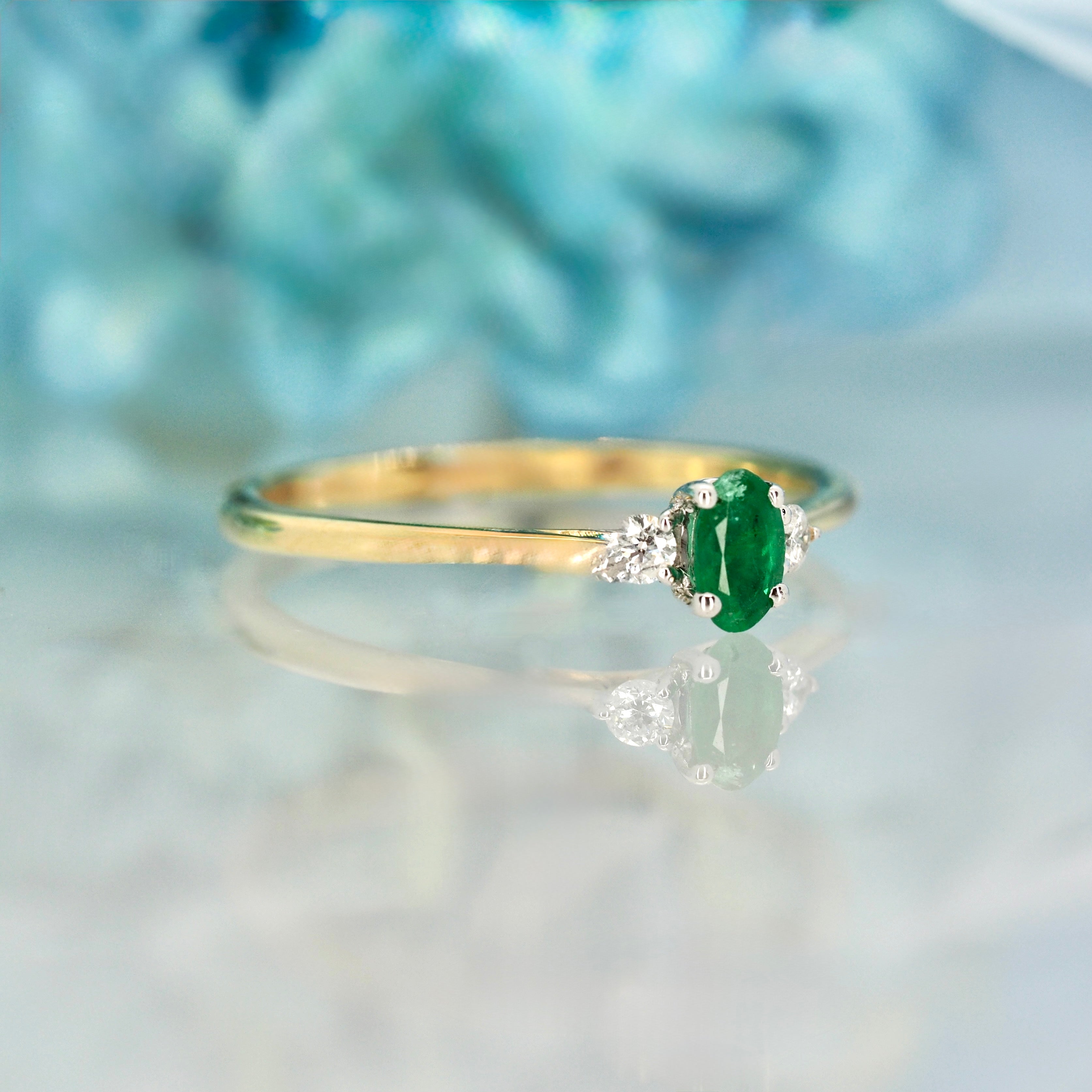 9ct Yellow Gold Oval Cut Emerald & Round Brilliant Cut Diamond Trilogy Ring