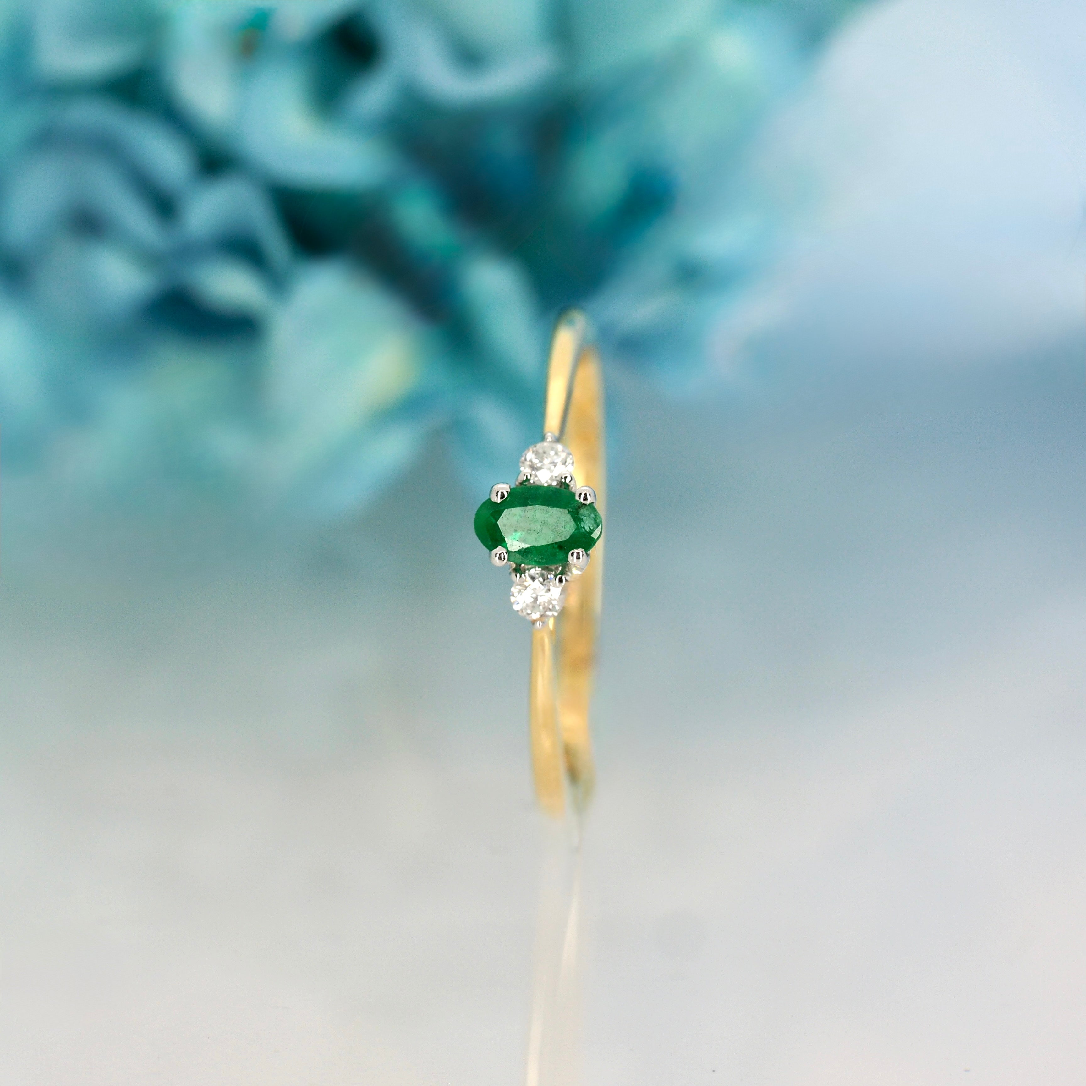 9ct Yellow Gold Oval Cut Emerald & Round Brilliant Cut Diamond Trilogy Ring