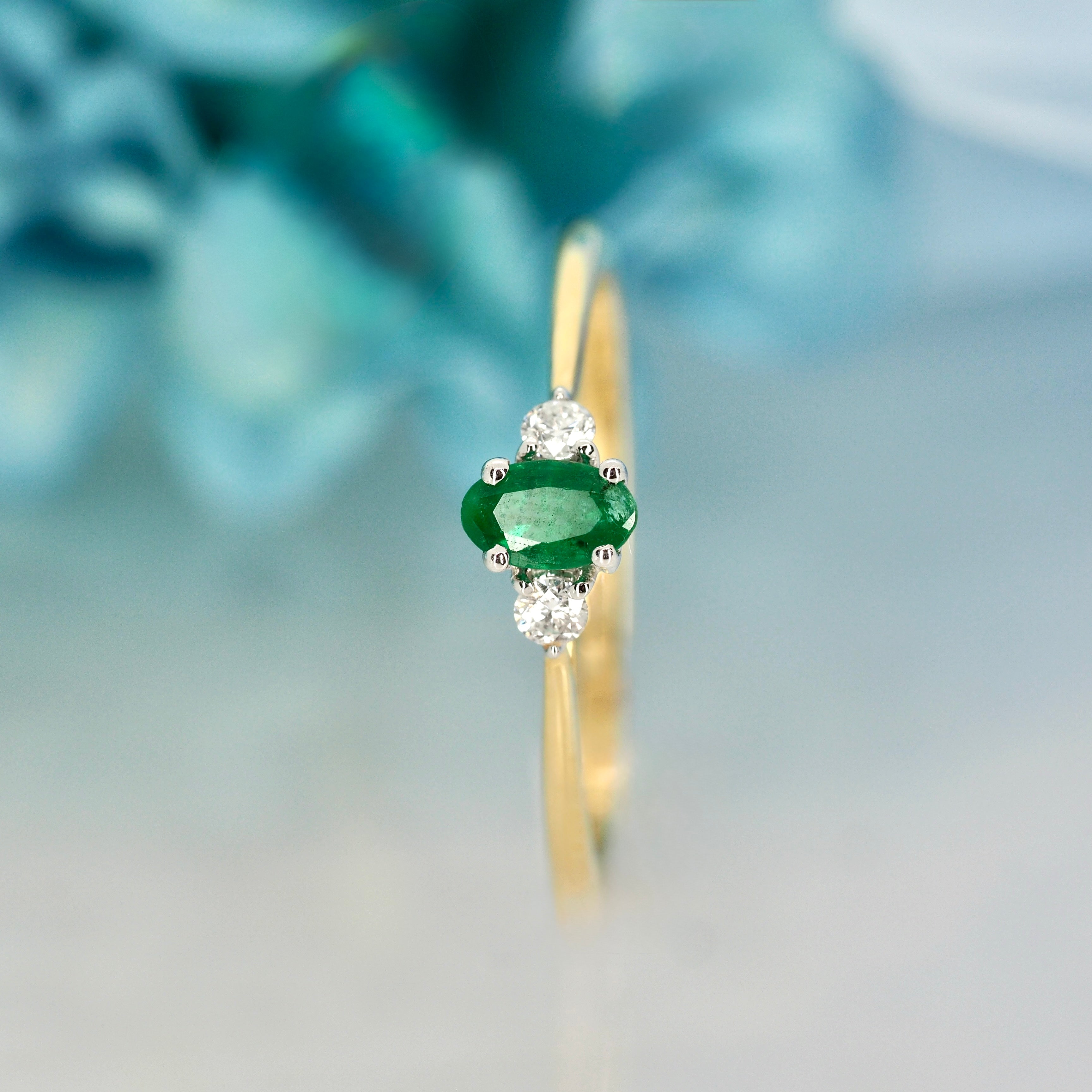 9ct Yellow Gold Oval Cut Emerald & Round Brilliant Cut Diamond Trilogy Ring