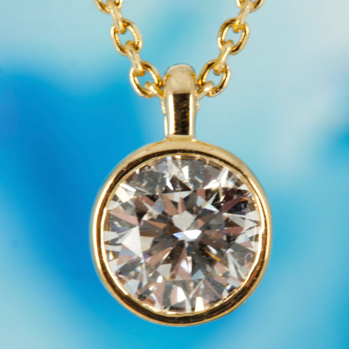 9ct Yellow Gold 0.50ct Round Brilliant Cut Lab Grown Diamond Pendant on a 16”-18” Chain