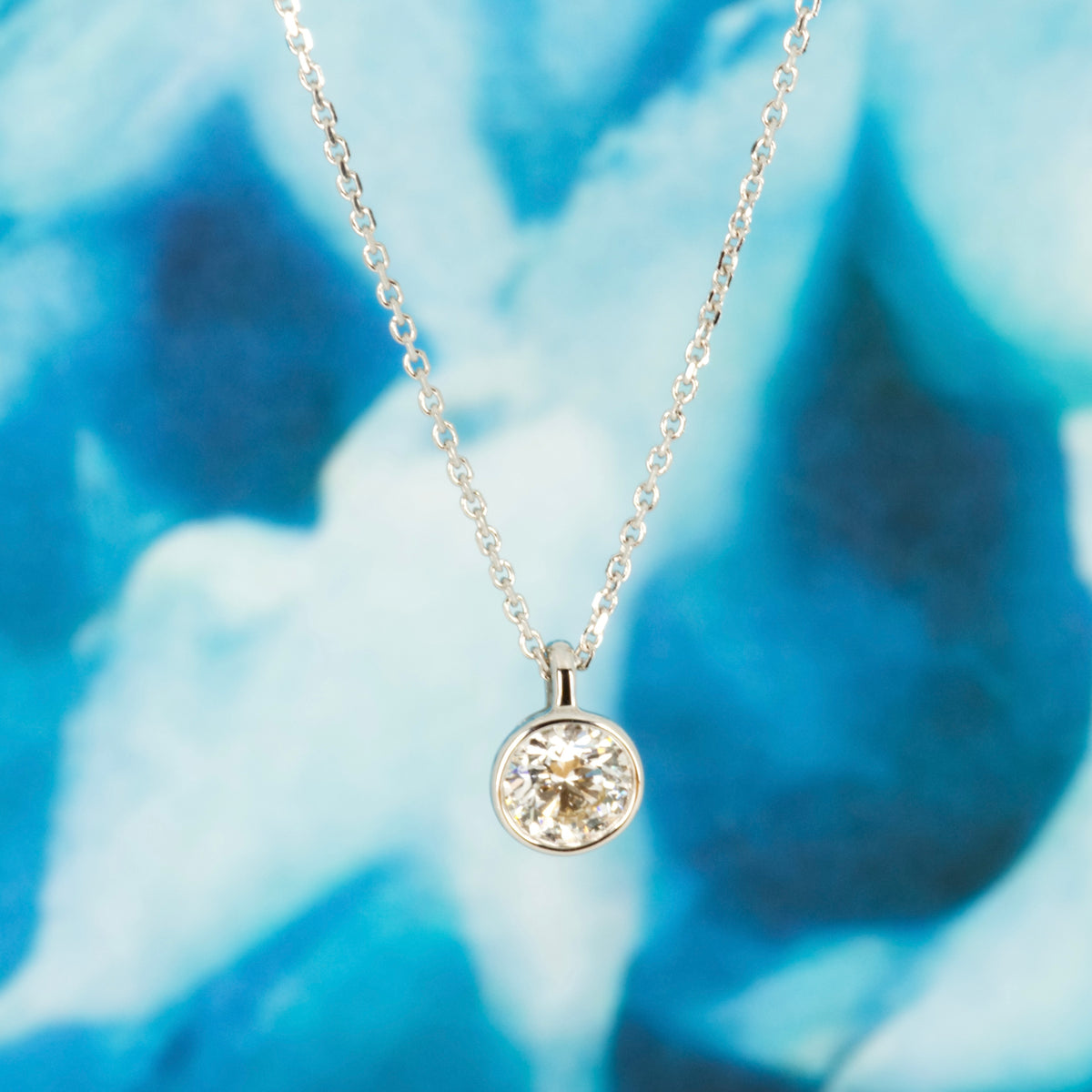 9ct White Gold 0.50ct Round Brilliant Cut Lab Grown Diamond Pendant on a 16”-18” Chain