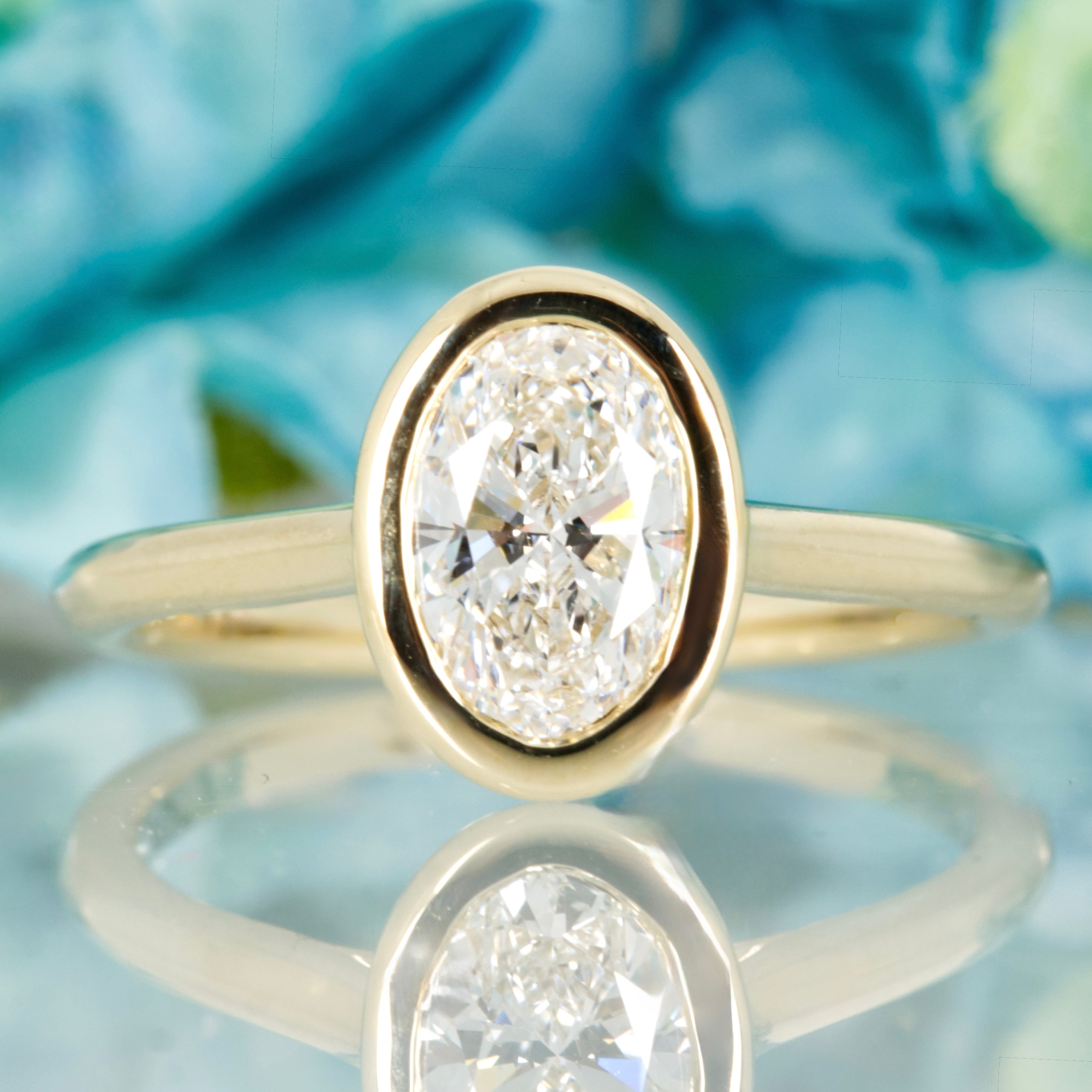 9ct Yellow Gold 1.00ct Oval Cut Lab Grown Diamond Bezel Set Solitaire Ring