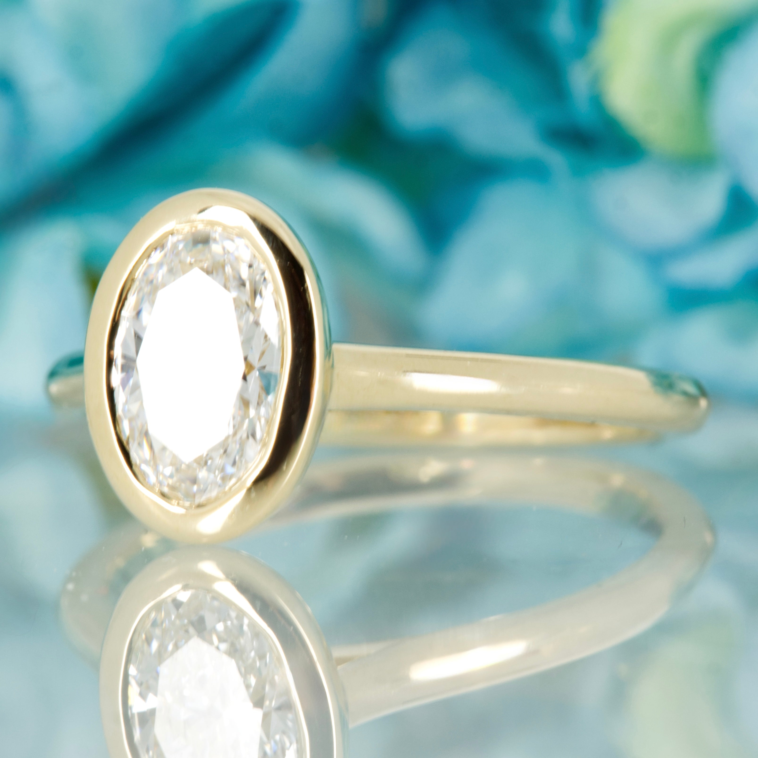 9ct Yellow Gold 1.00ct Oval Cut Lab Grown Diamond Bezel Set Solitaire Ring