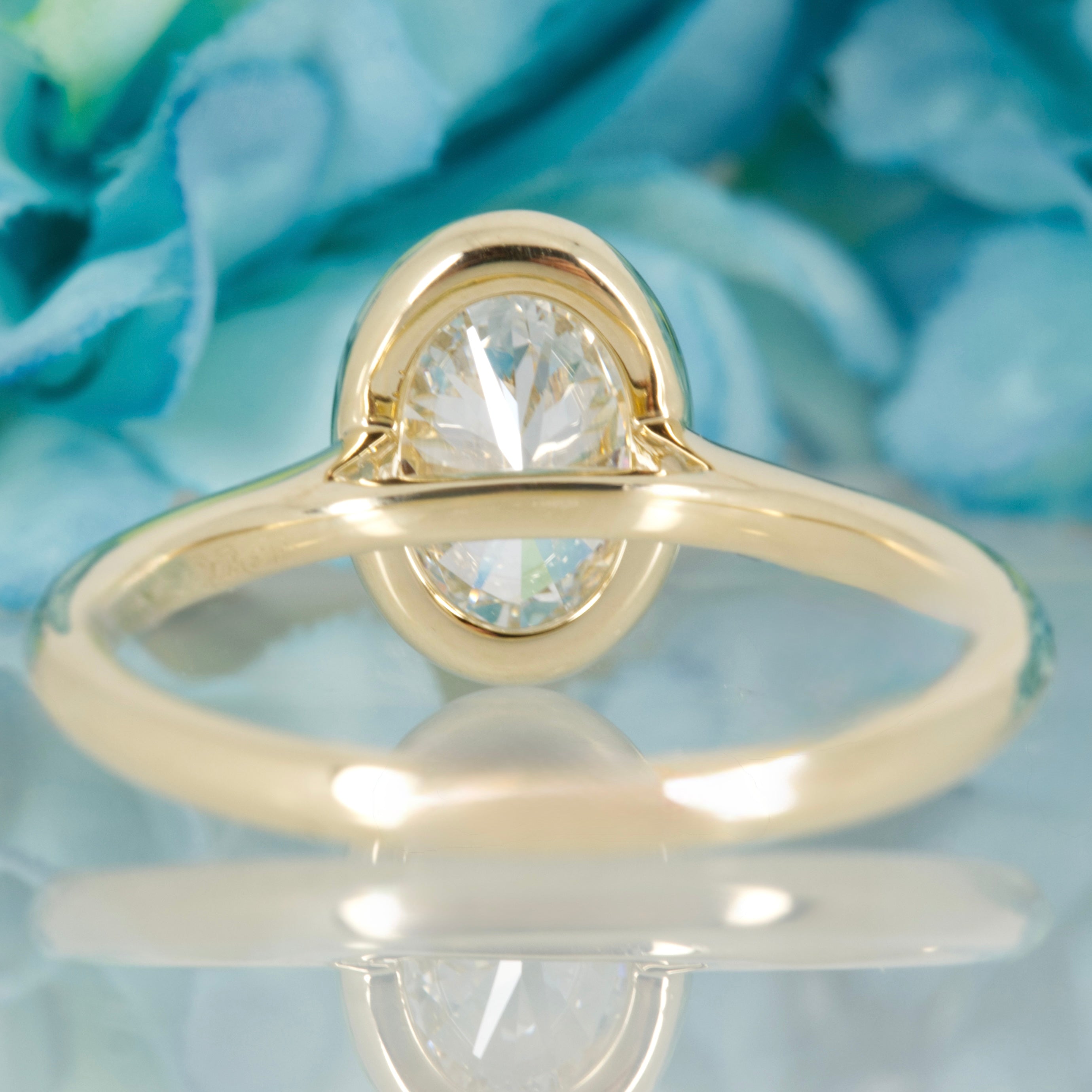 9ct Yellow Gold 1.00ct Oval Cut Lab Grown Diamond Bezel Set Solitaire Ring