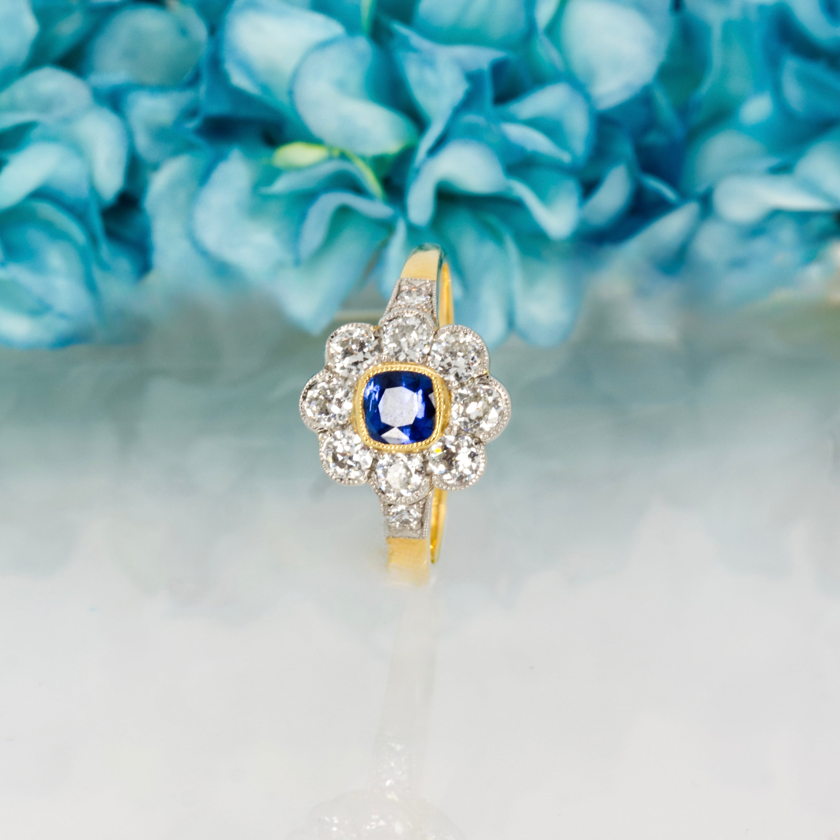 Pre-Loved 18ct Yellow Gold & Platinum Cushion Cut Sapphire & Diamond Daisy Cluster Ring
