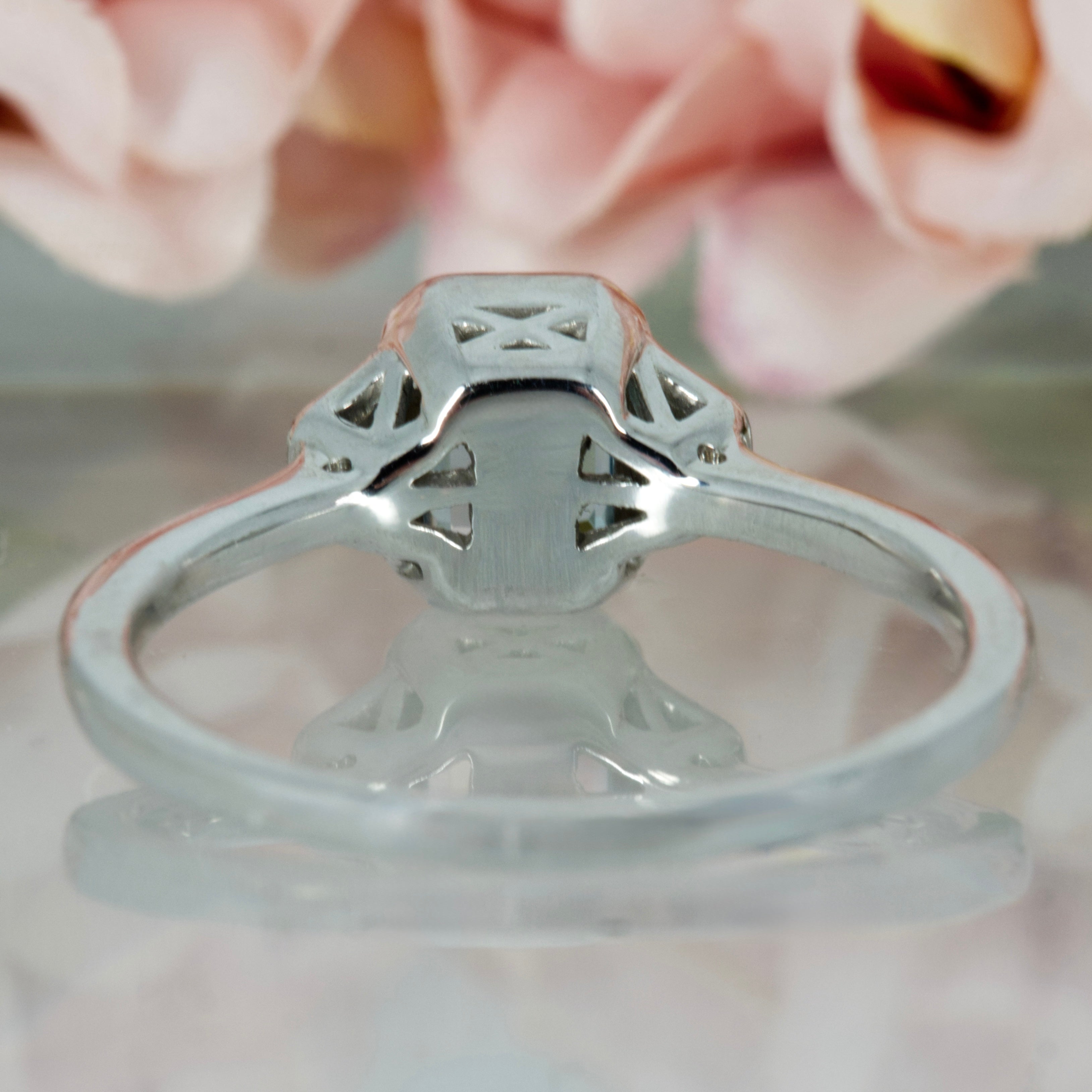 9ct White Gold Octagonal Cut Blue Topaz & Round Brilliant Cut Diamond Ring