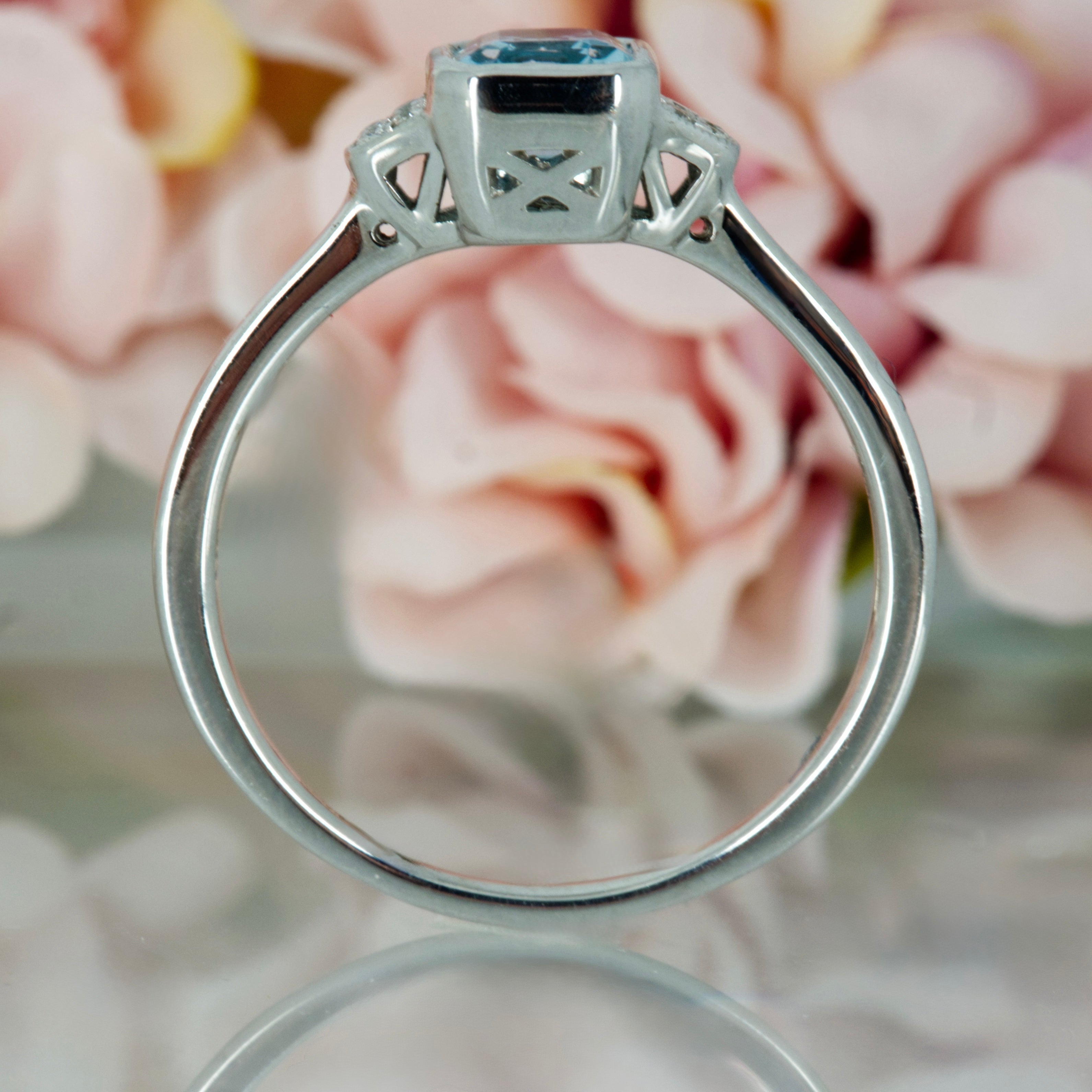 9ct White Gold Octagonal Cut Blue Topaz & Round Brilliant Cut Diamond Ring