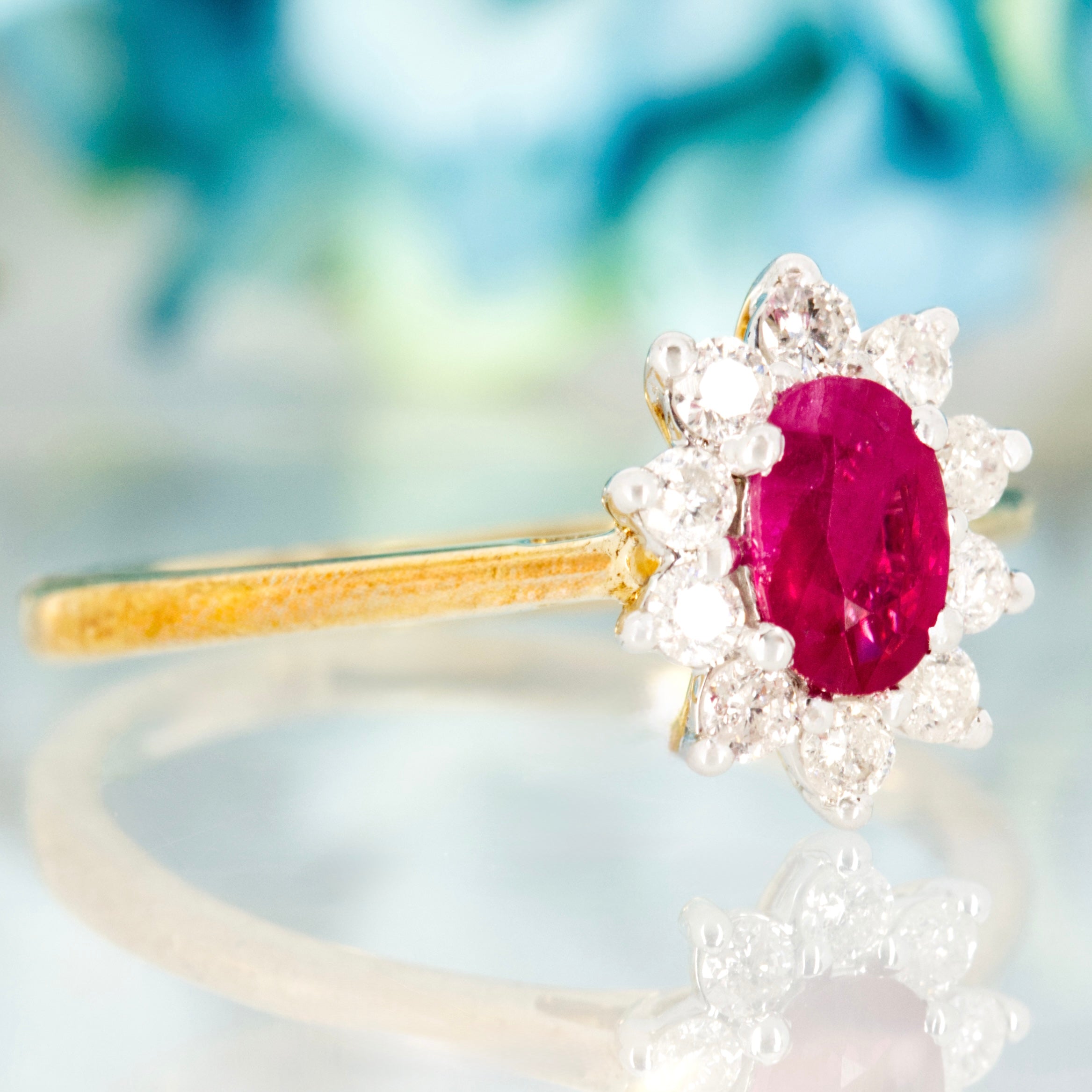 9ct Yellow Gold Oval Cut Ruby & Round Brilliant Cut Diamond Cluster Ring
