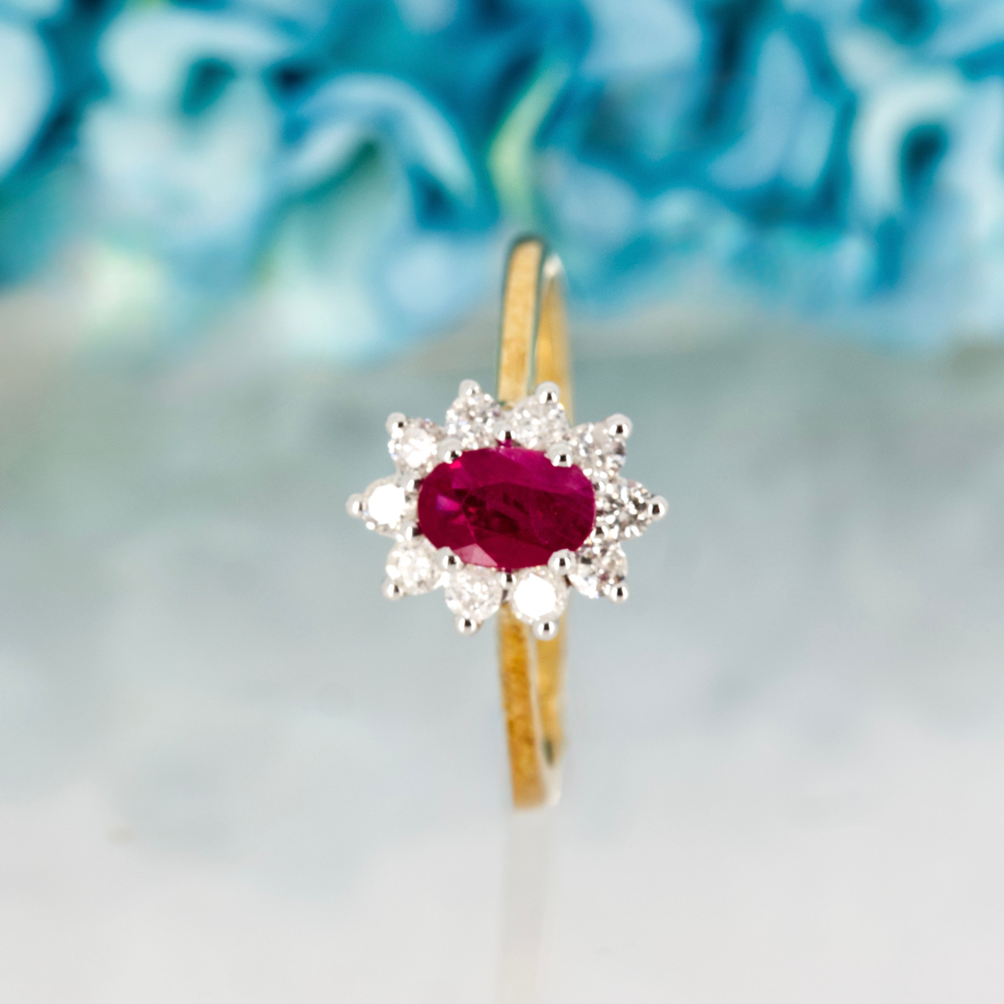 9ct Yellow Gold Oval Cut Ruby & Round Brilliant Cut Diamond Cluster Ring