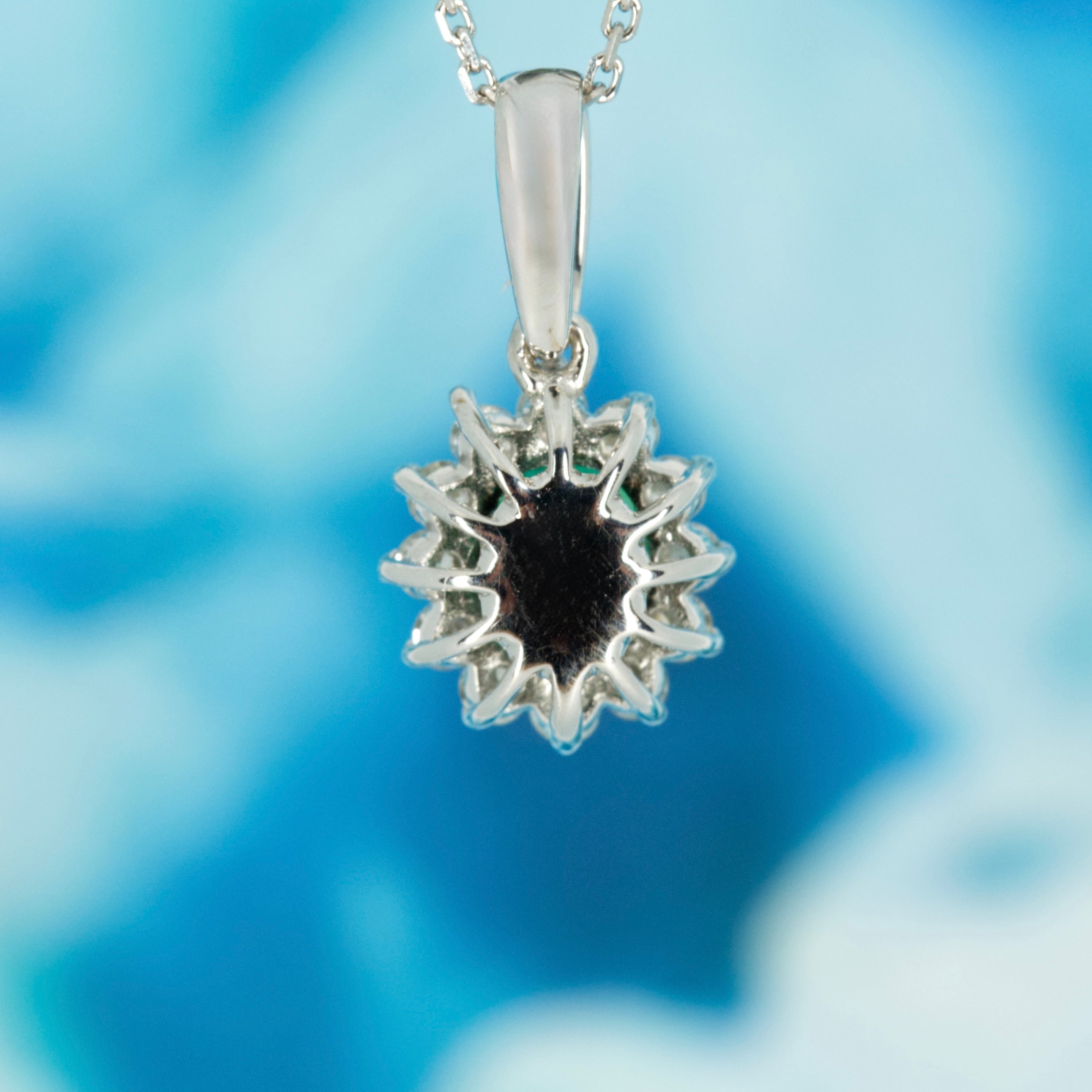 9ct White Gold Oval Cut Emerald & Round Brilliant Cut Diamond Cluster Pendant & Chain