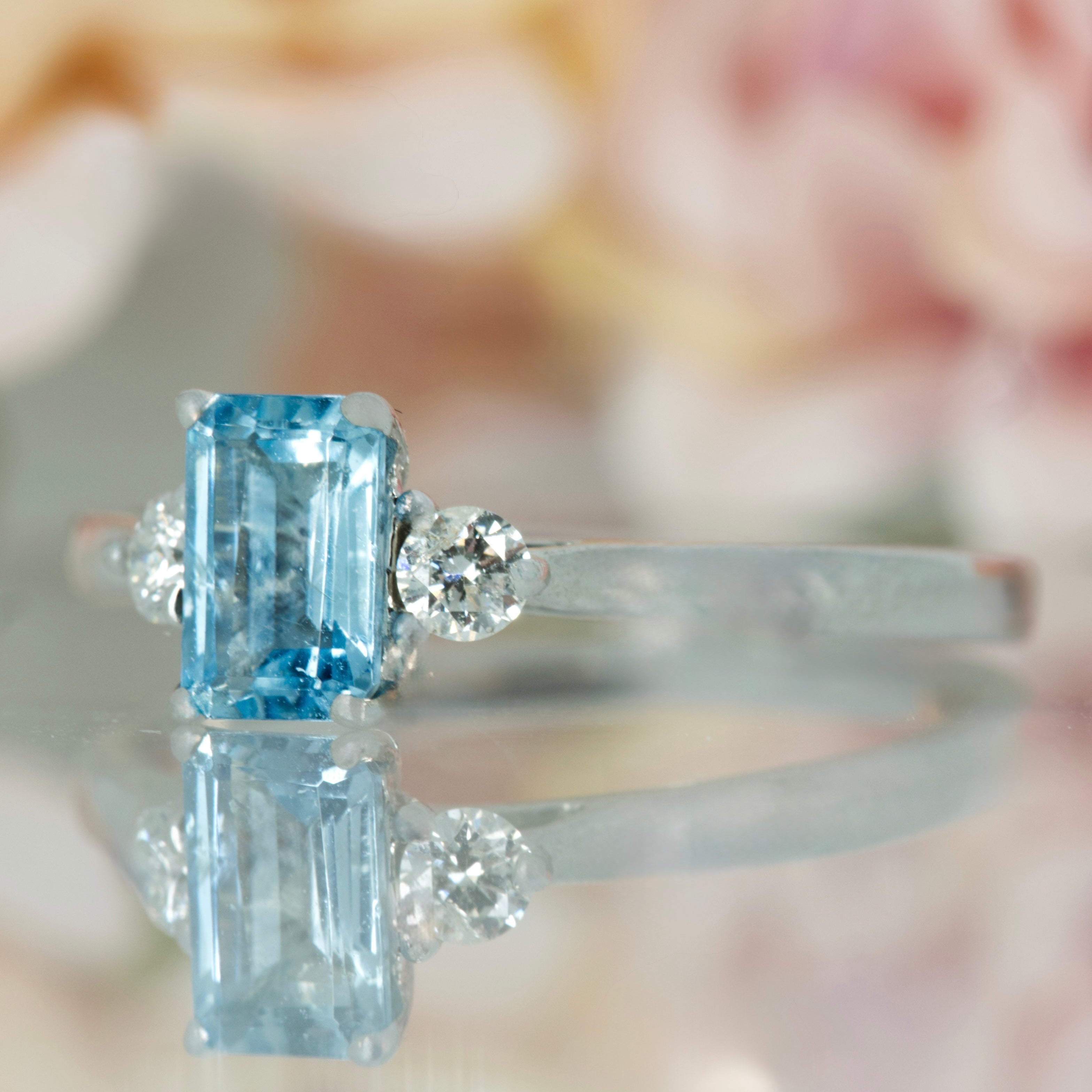 Platinum Octagonal Cut Aquamarine & Round Brilliant Cut Diamond Trilogy Ring
