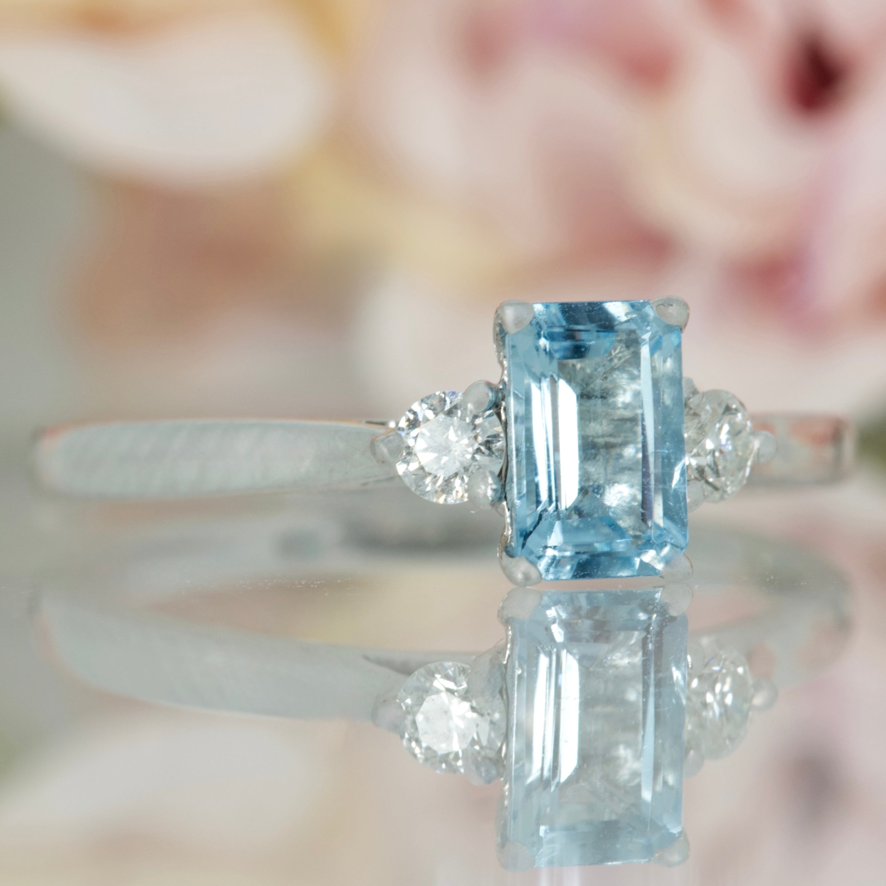 Platinum Octagonal Cut Aquamarine & Round Brilliant Cut Diamond Trilogy Ring