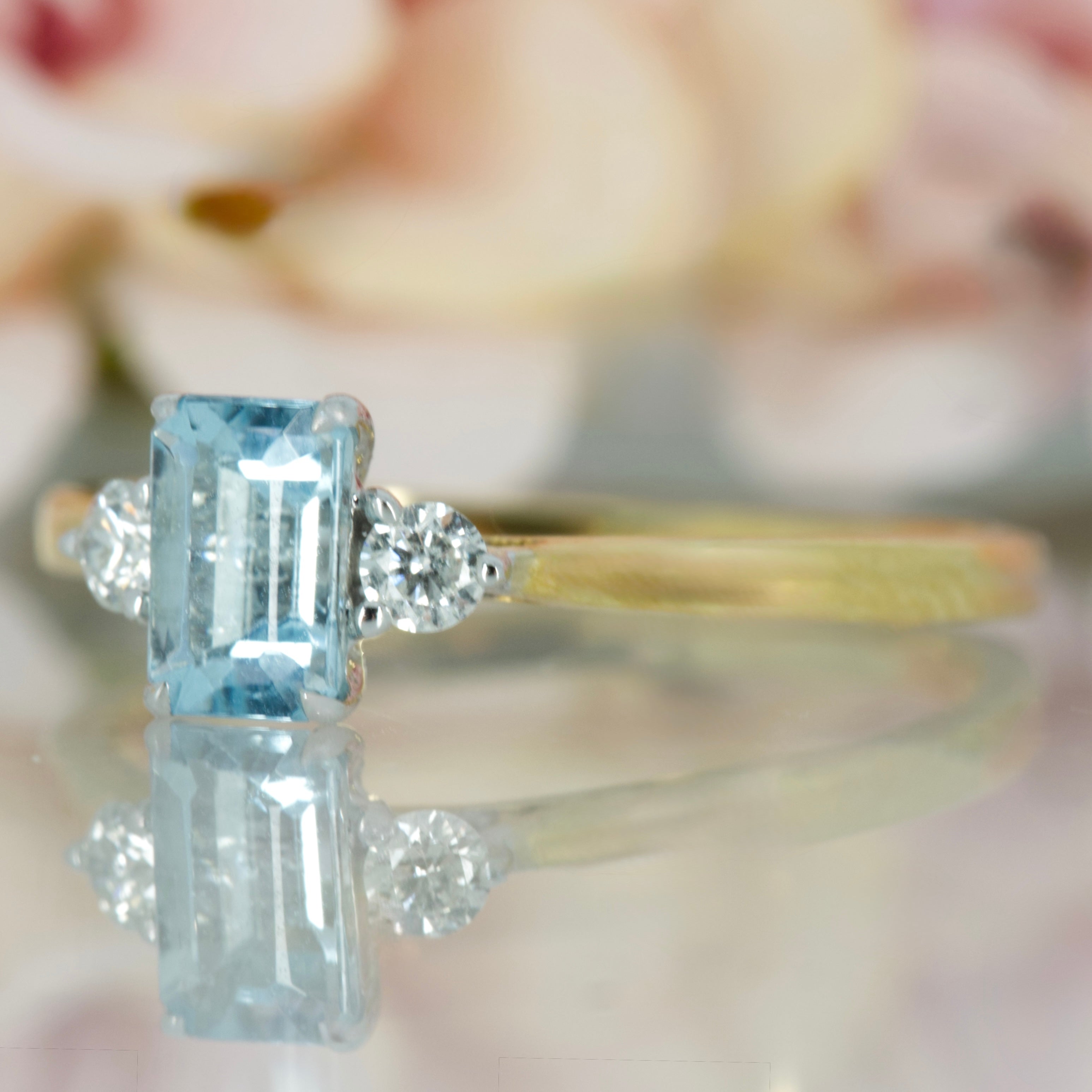 18ct Yellow Gold Octagonal Cut Aquamarine & Round Brilliant Cut Diamond Trilogy Ring
