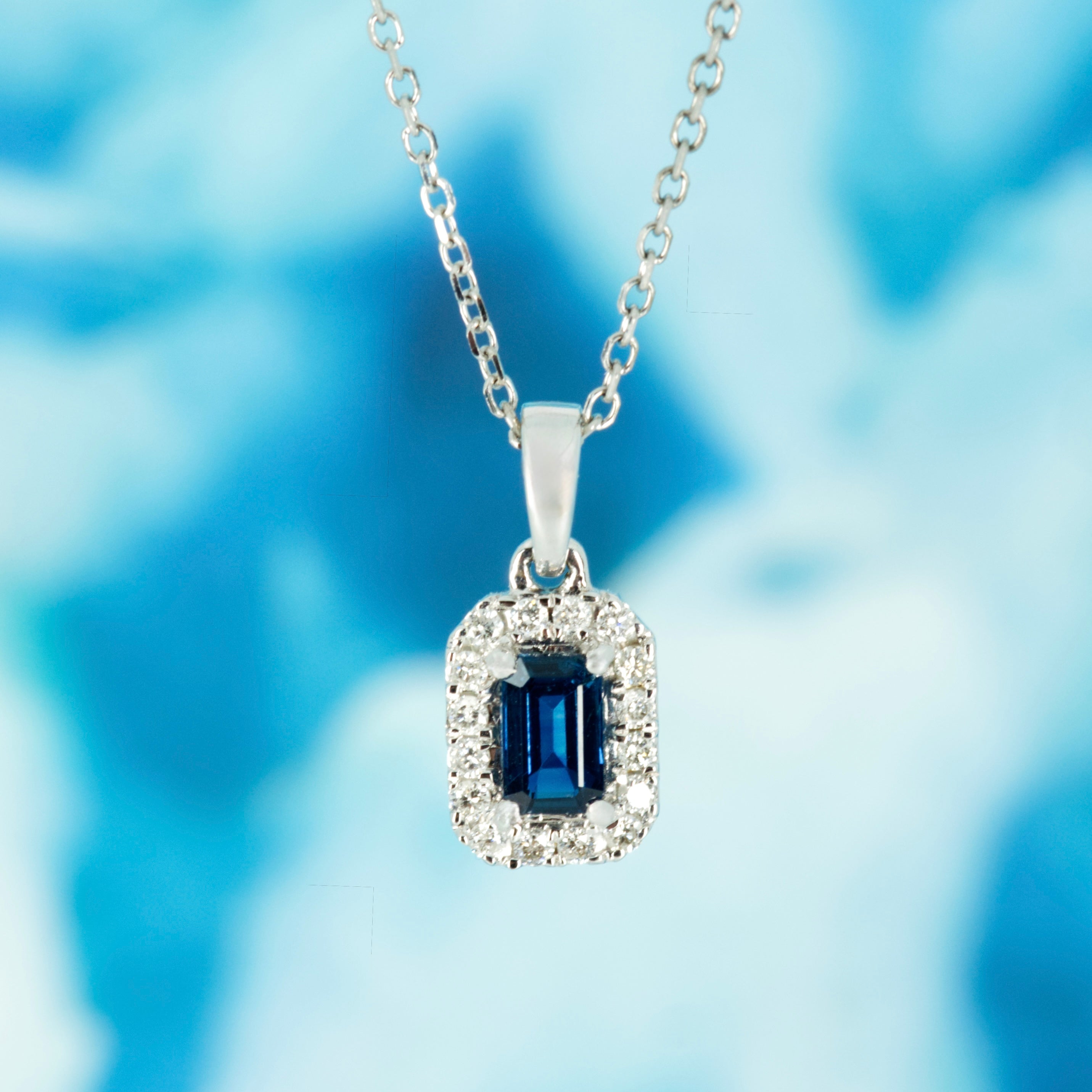 18ct White Gold Rectangular Cut Sapphire & Round Brilliant Cut Diamond Halo Cluster Pendant & Chain