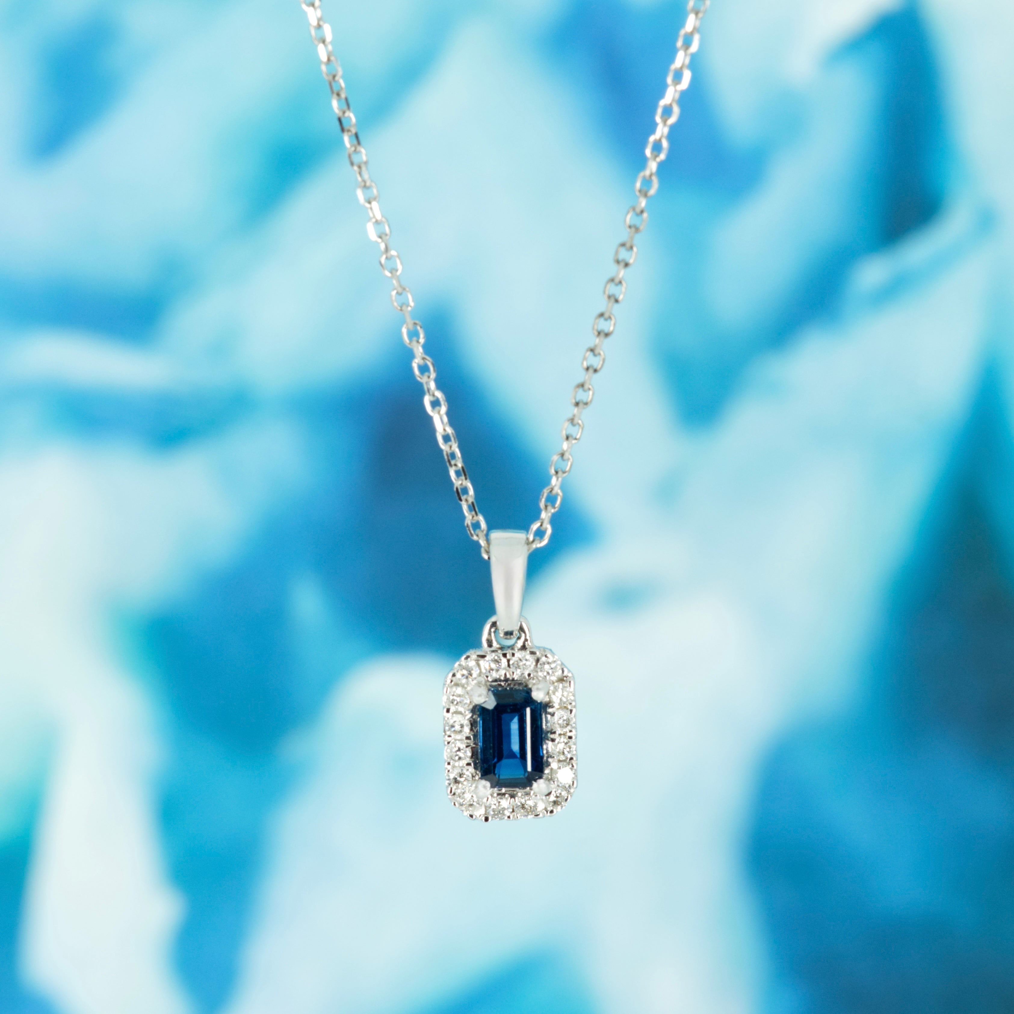 18ct White Gold Rectangular Cut Sapphire & Round Brilliant Cut Diamond Halo Cluster Pendant & Chain