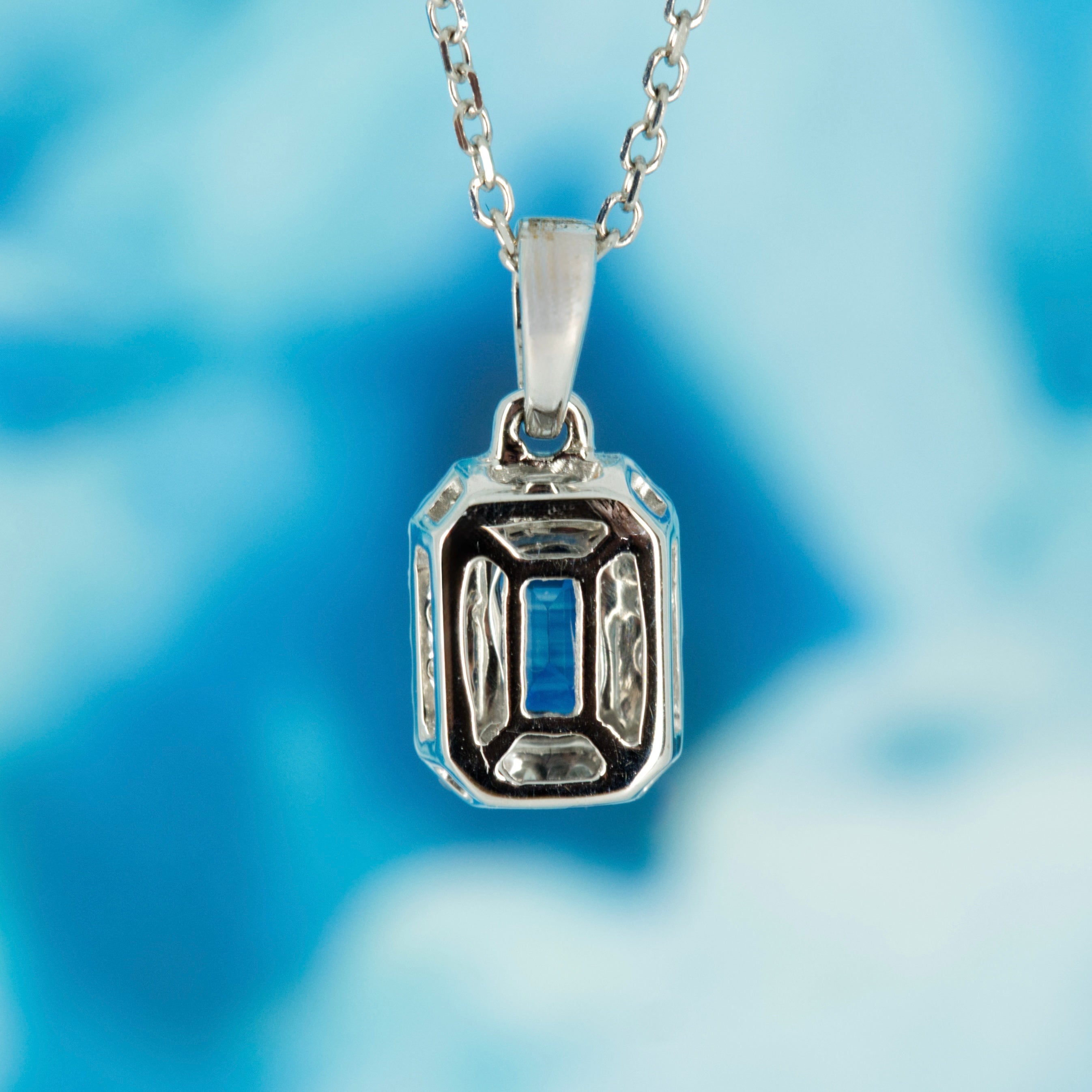 18ct White Gold Rectangular Cut Sapphire & Round Brilliant Cut Diamond Halo Cluster Pendant & Chain