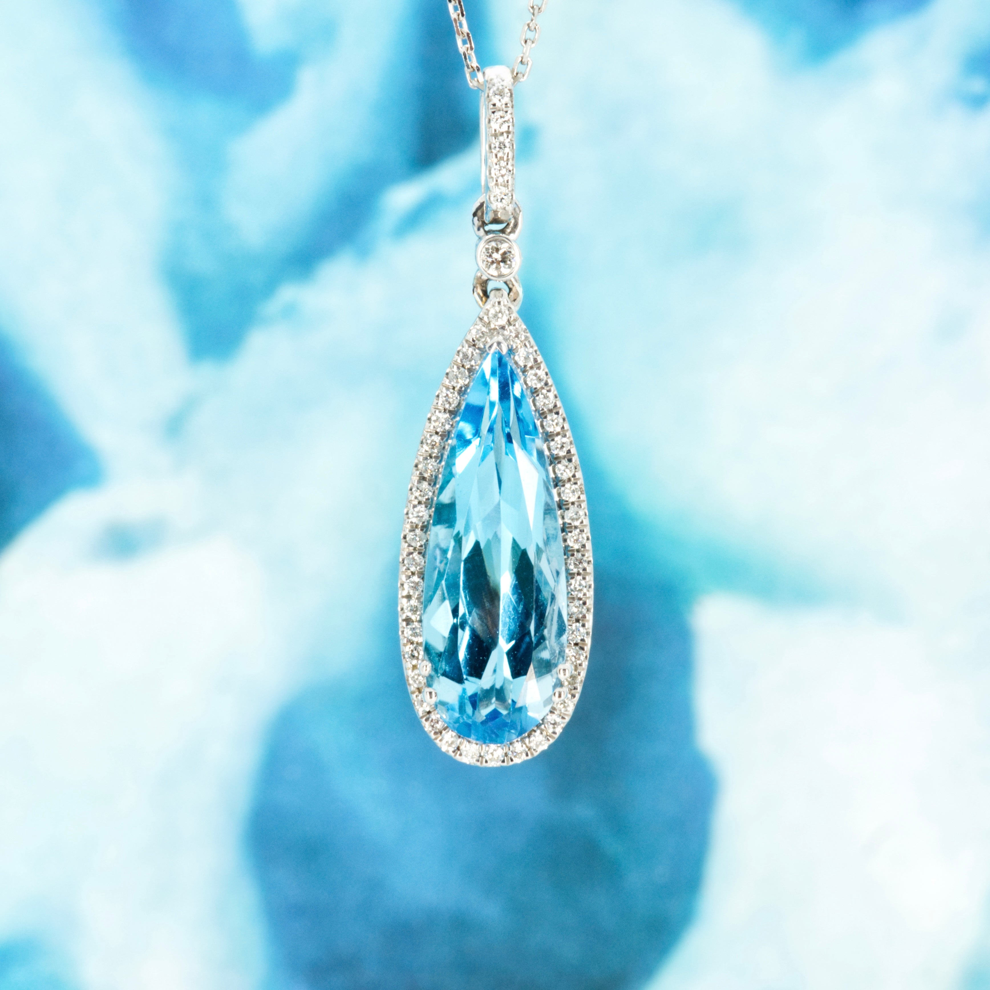 9ct White Gold Pear Shaped Blue Topaz & Round Brilliant Cut Diamond Pendant & Chain
