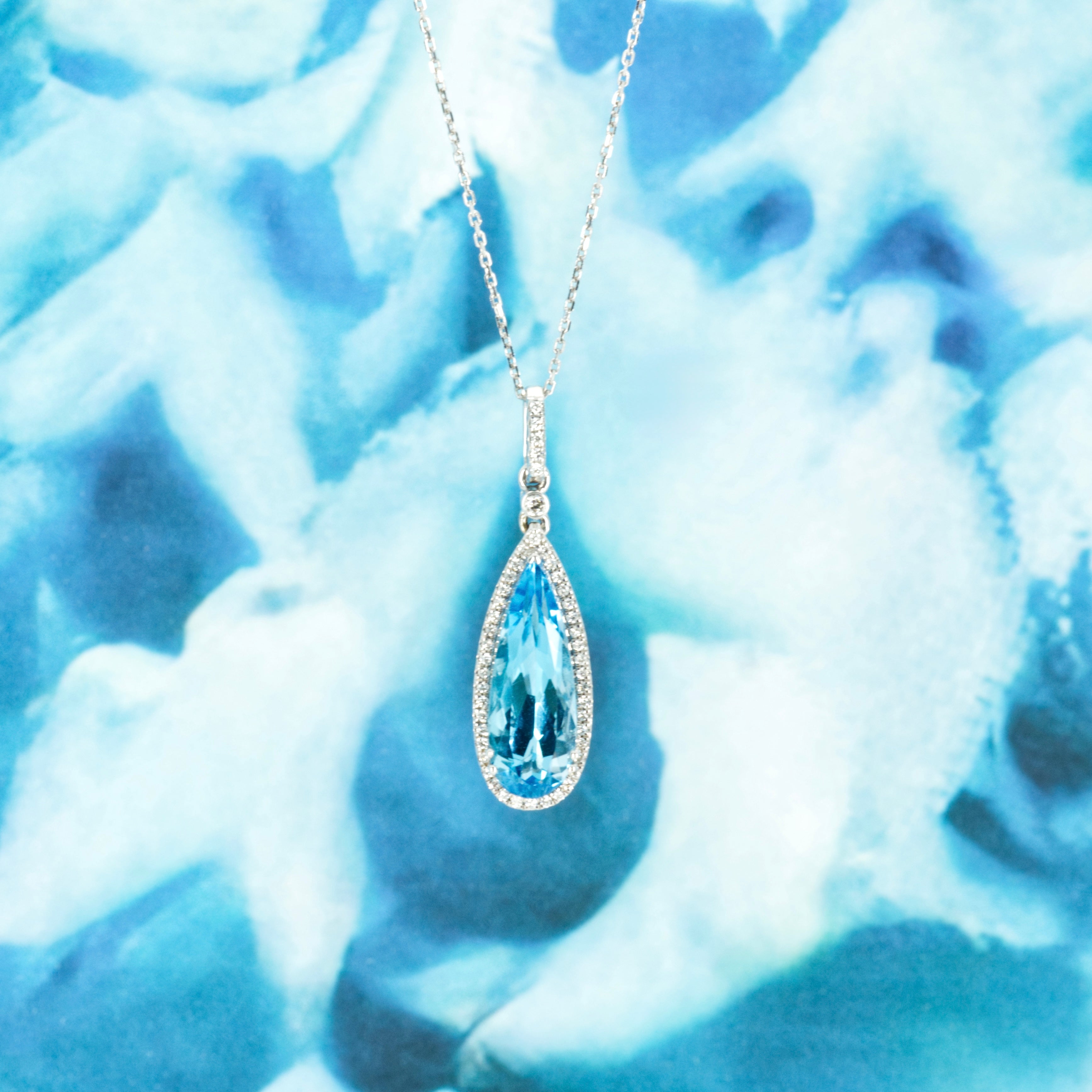 9ct White Gold Pear Shaped Blue Topaz & Round Brilliant Cut Diamond Pendant & Chain