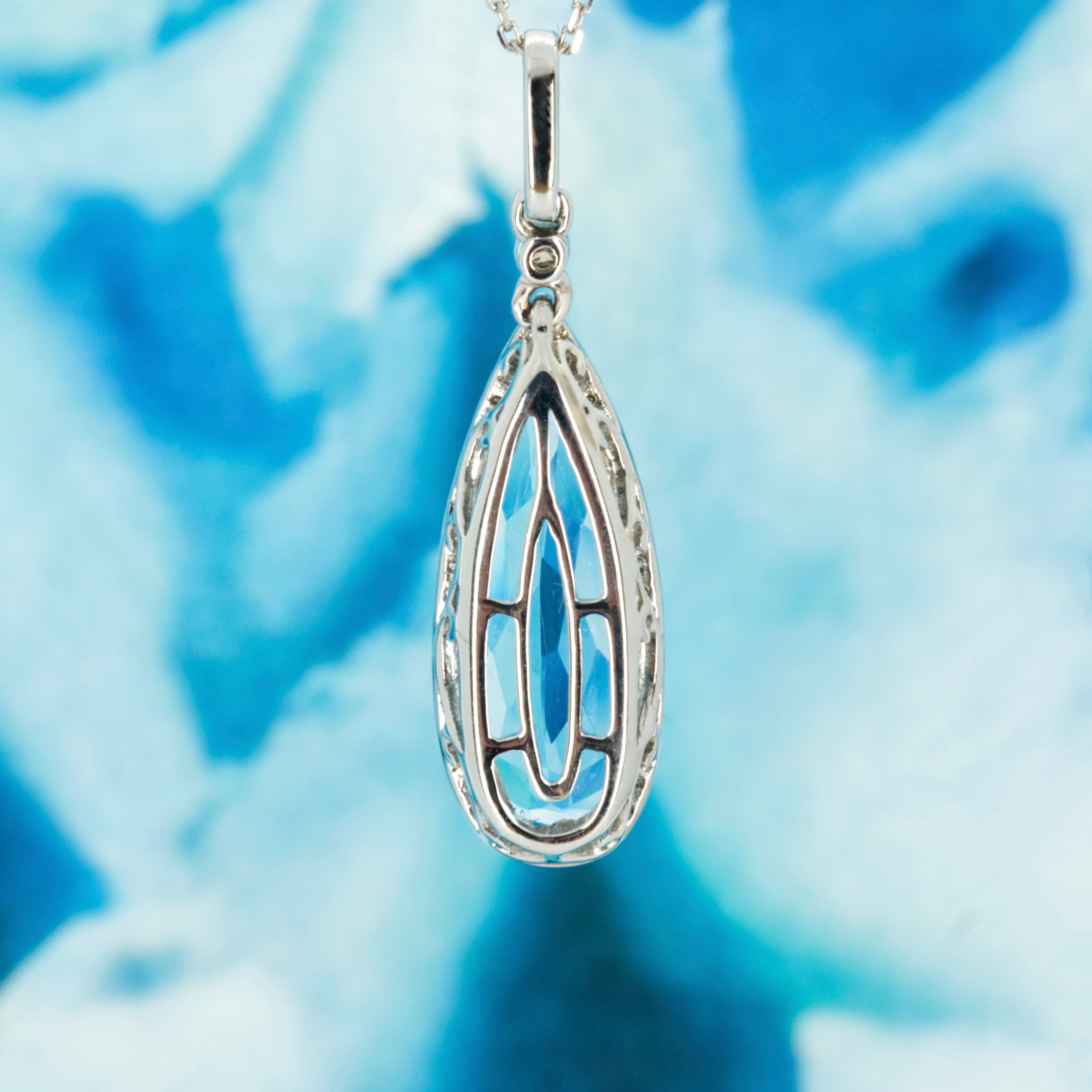 9ct White Gold Pear Shaped Blue Topaz & Round Brilliant Cut Diamond Pendant & Chain