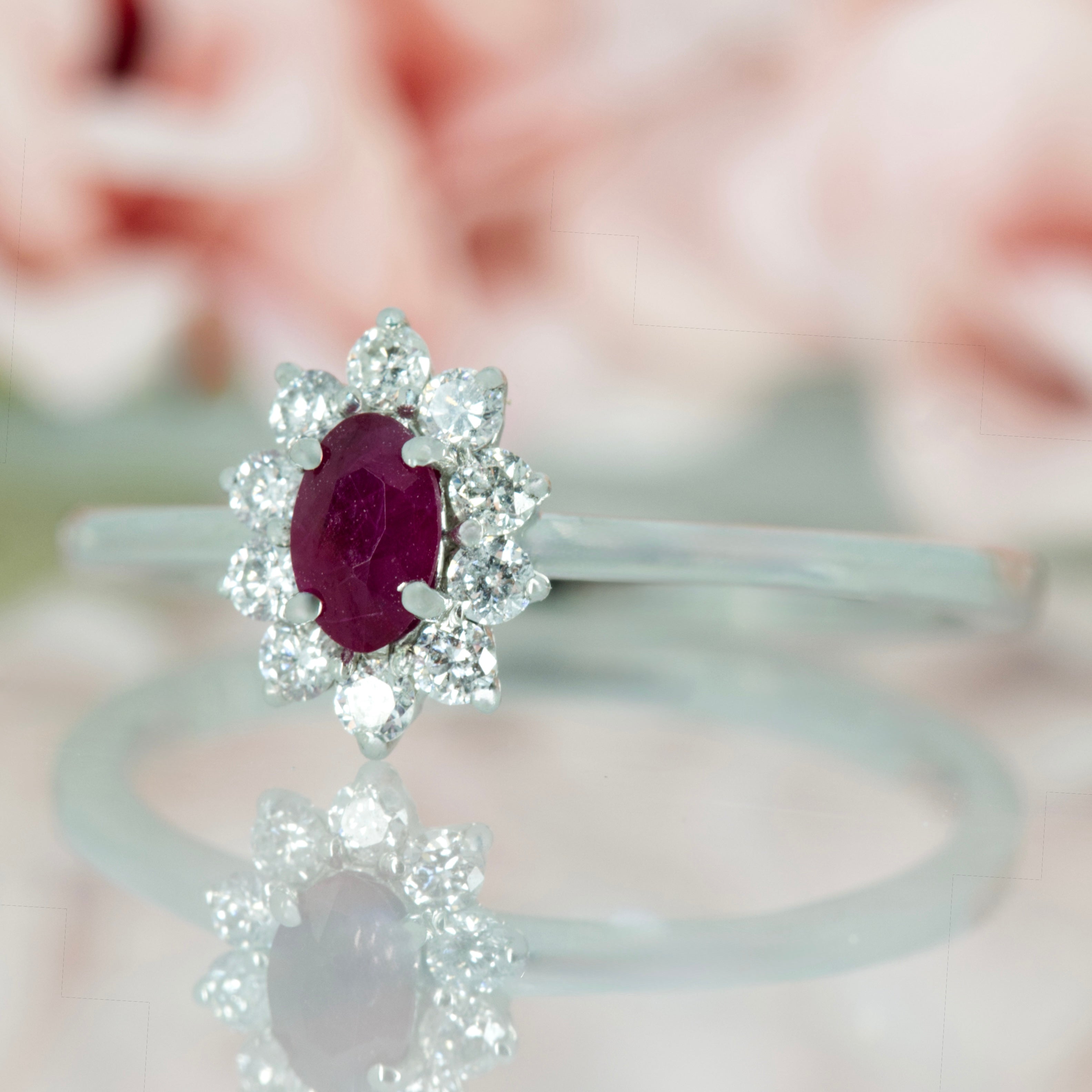 Platinum Oval Cut Ruby & Round Brilliant Cut Diamond Cluster Ring