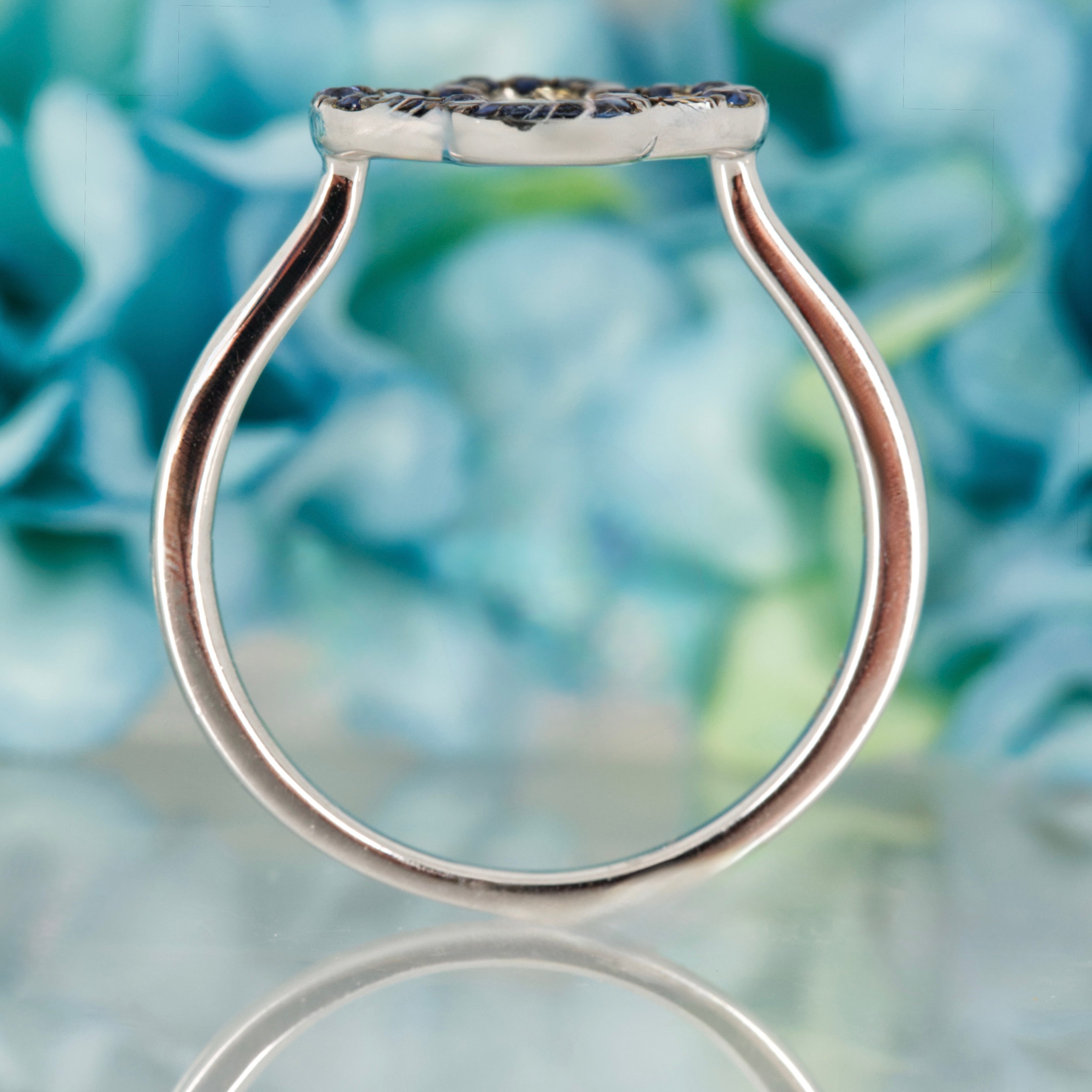 18ct White Gold Claw Set Round Cut Sapphire Openwork Clover Cluster Ring