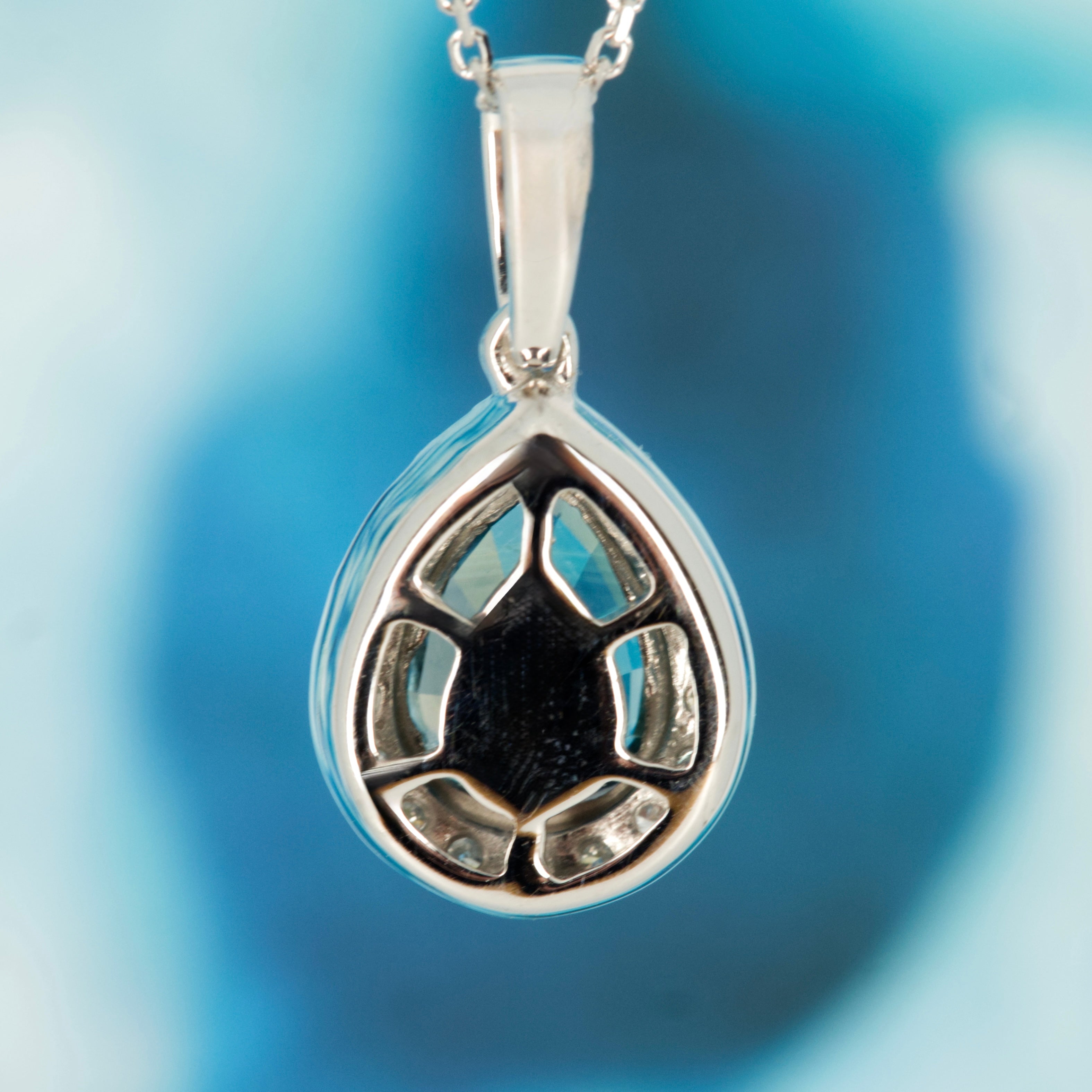 9ct White Gold Pear Cut Teal Sapphire & Round Brilliant Cut Diamond Halo Cluster Pendant & Chain