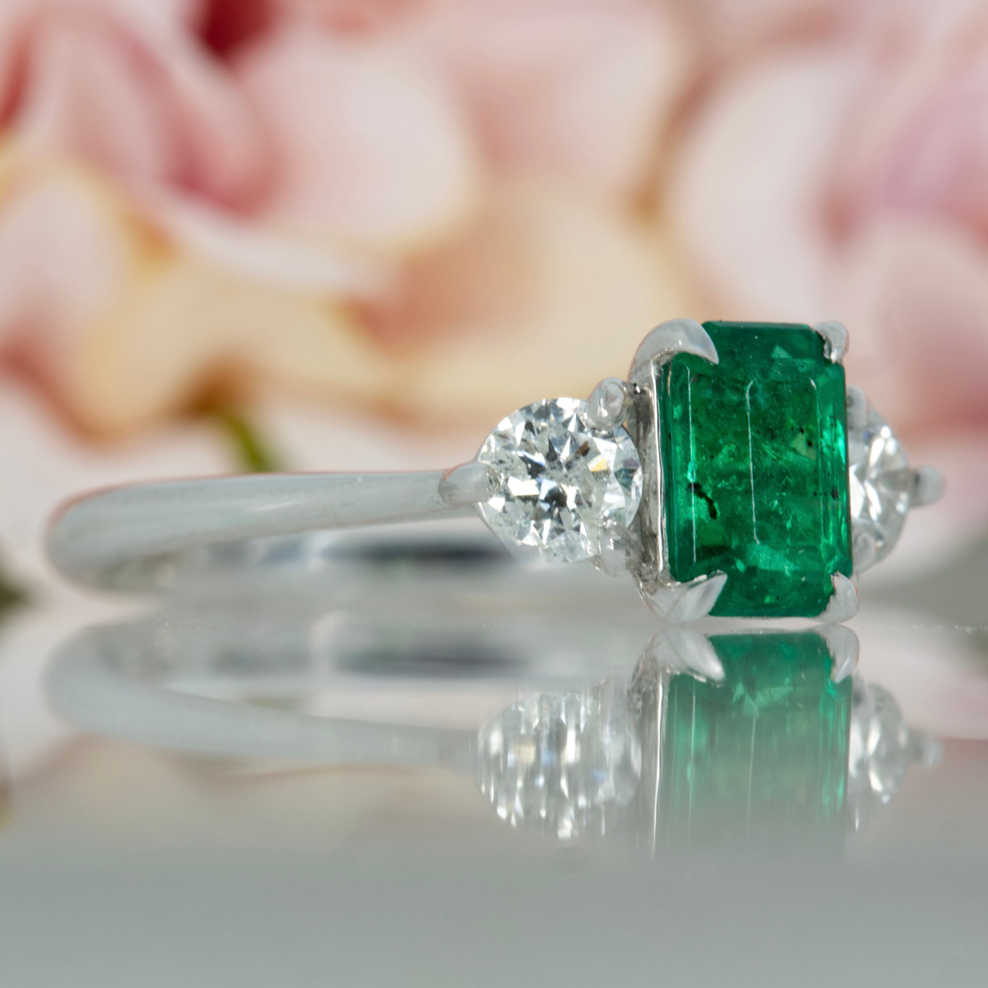 Platinum Octagonal Cut Emerald & Round Brilliant Cut Diamond Trilogy Ring