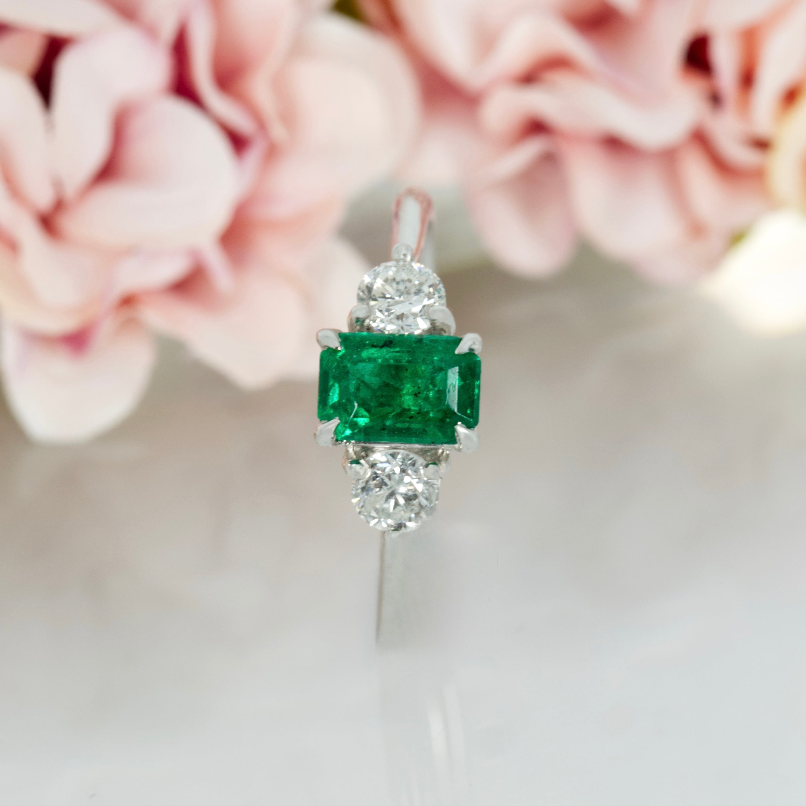 Platinum Octagonal Cut Emerald & Round Brilliant Cut Diamond Trilogy Ring