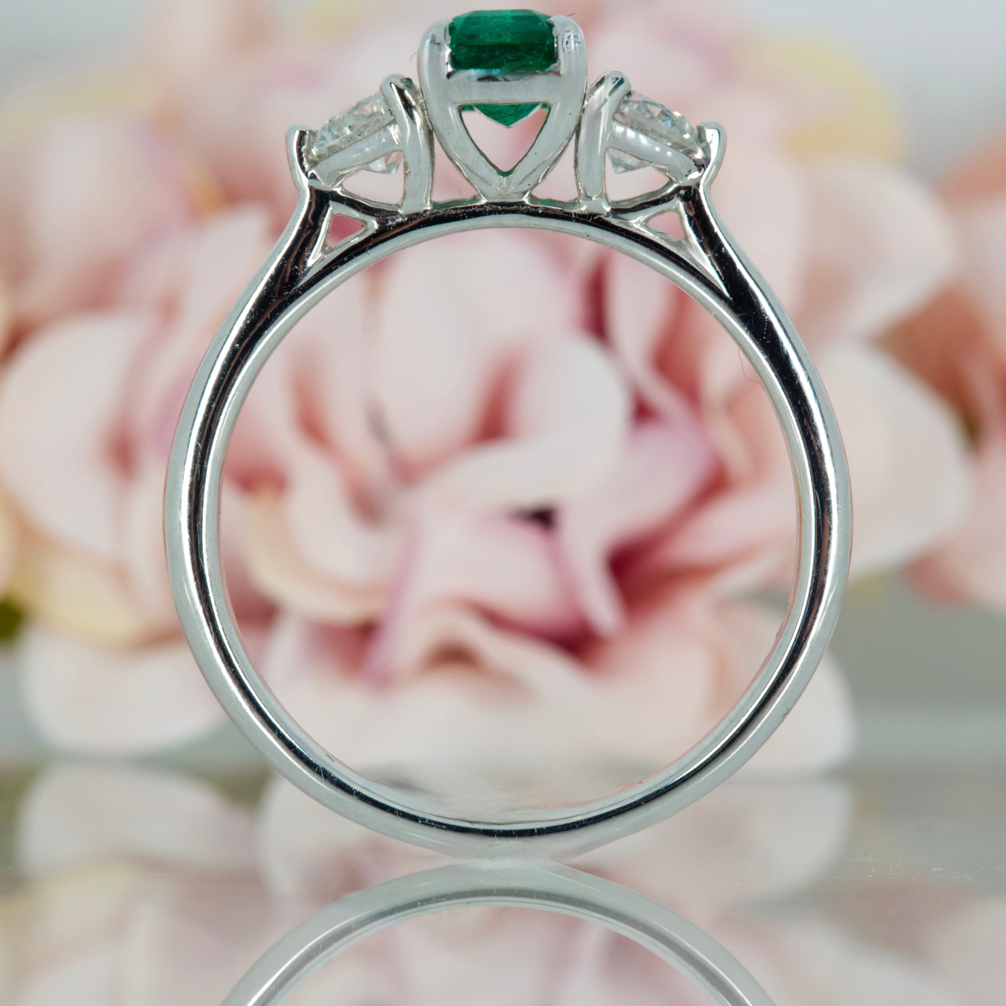 Platinum Octagonal Cut Emerald & Round Brilliant Cut Diamond Trilogy Ring