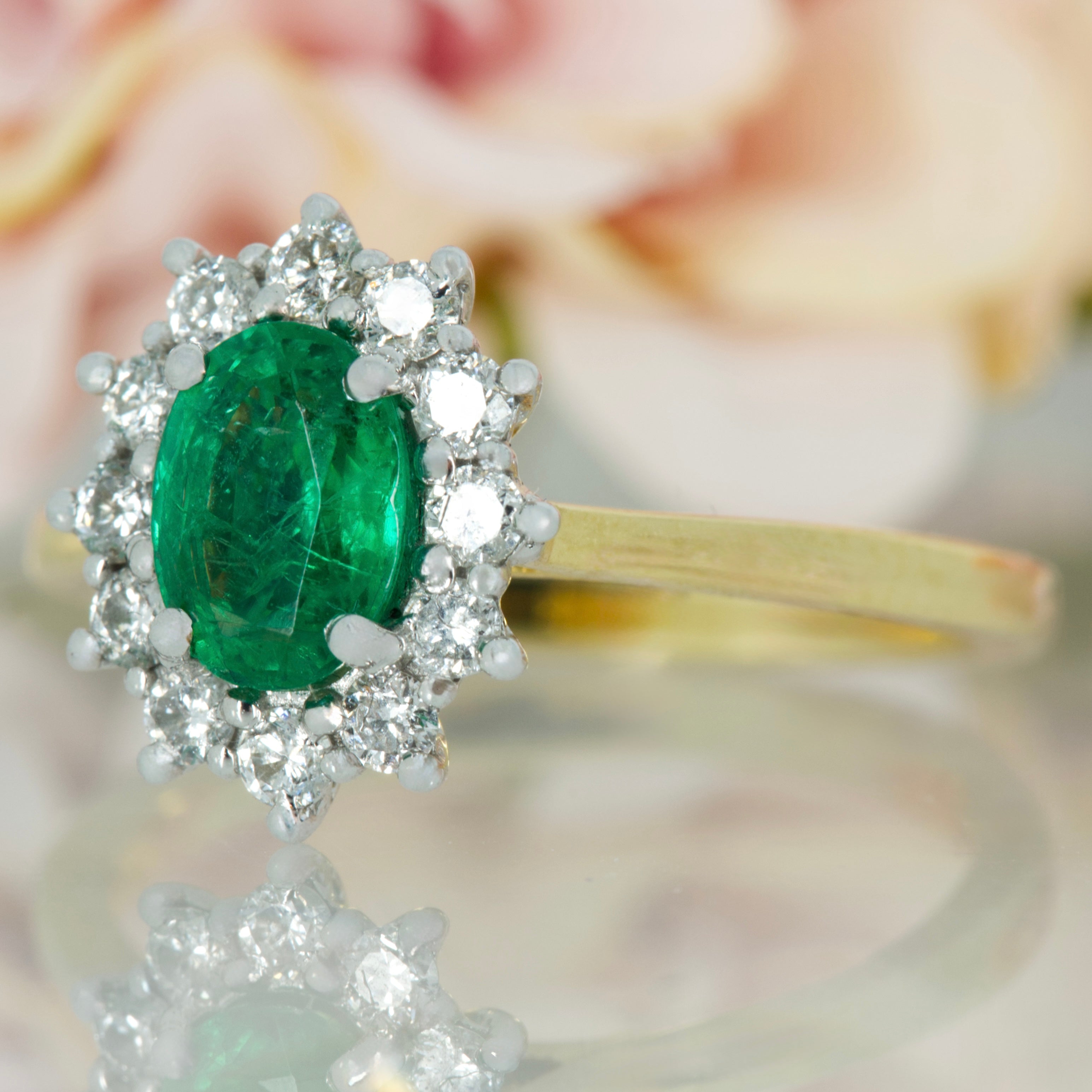 18ct Yellow Gold Oval Cut Emerald & Round Brilliant Cut Diamond Cluster Ring