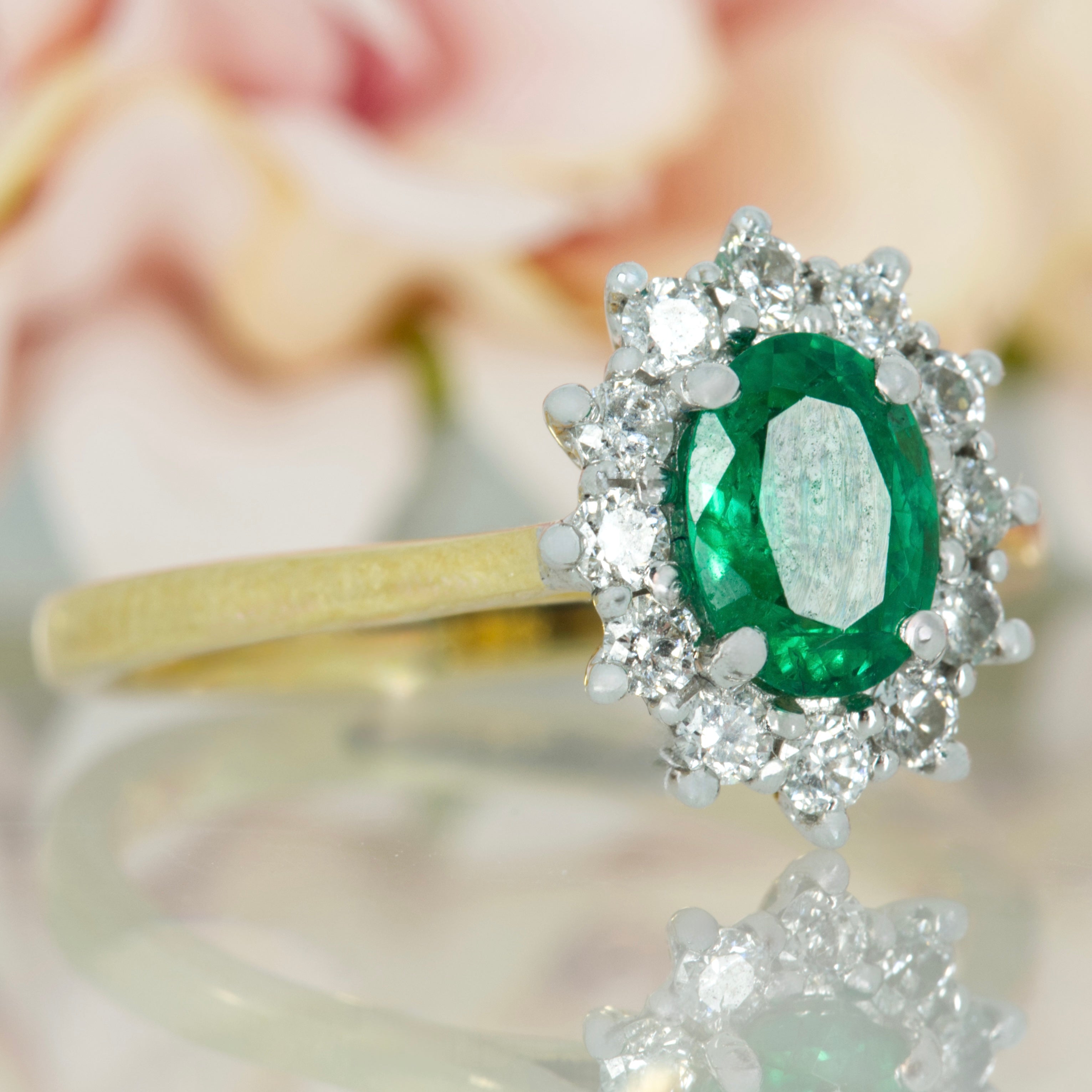 18ct Yellow Gold Oval Cut Emerald & Round Brilliant Cut Diamond Cluster Ring