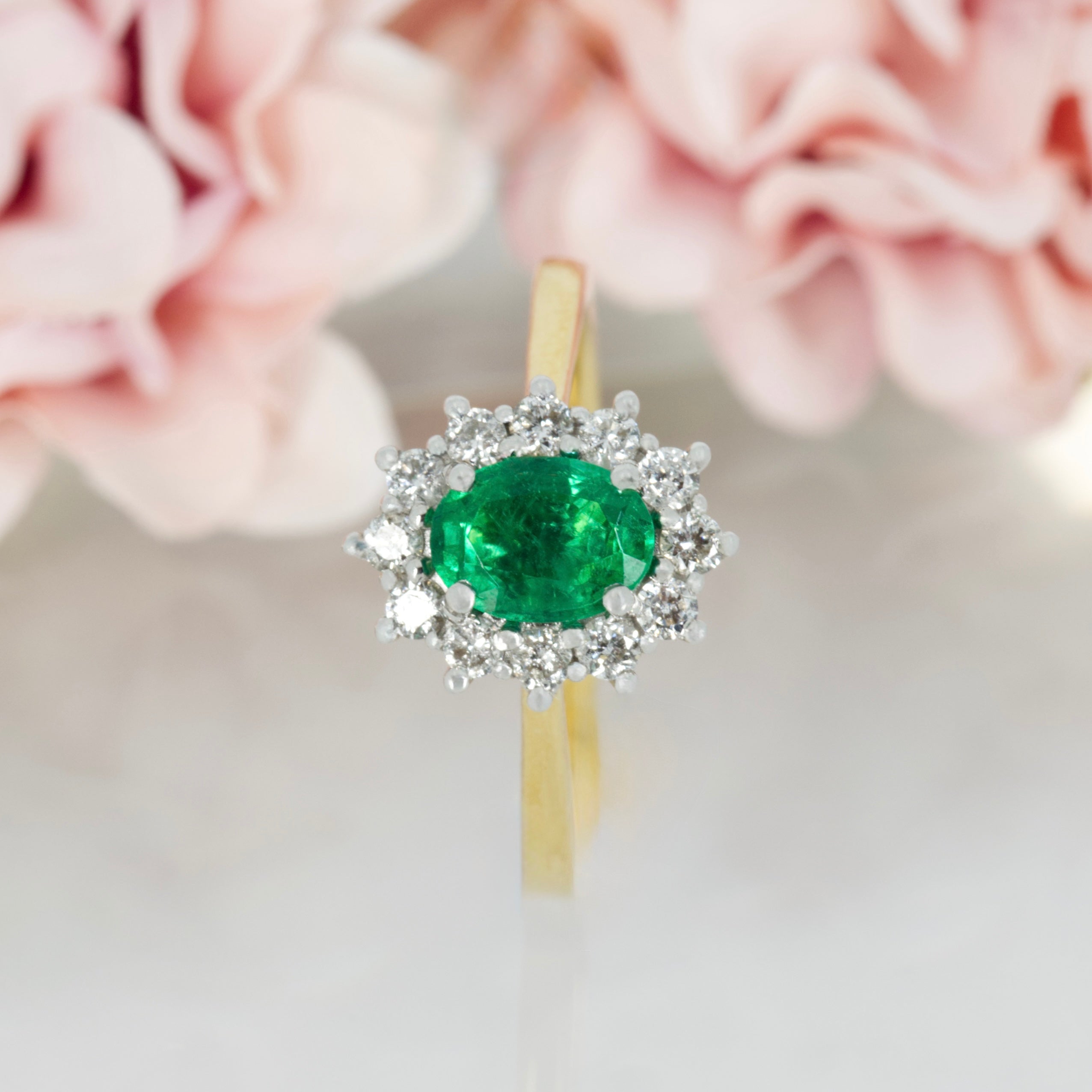18ct Yellow Gold Oval Cut Emerald & Round Brilliant Cut Diamond Cluster Ring