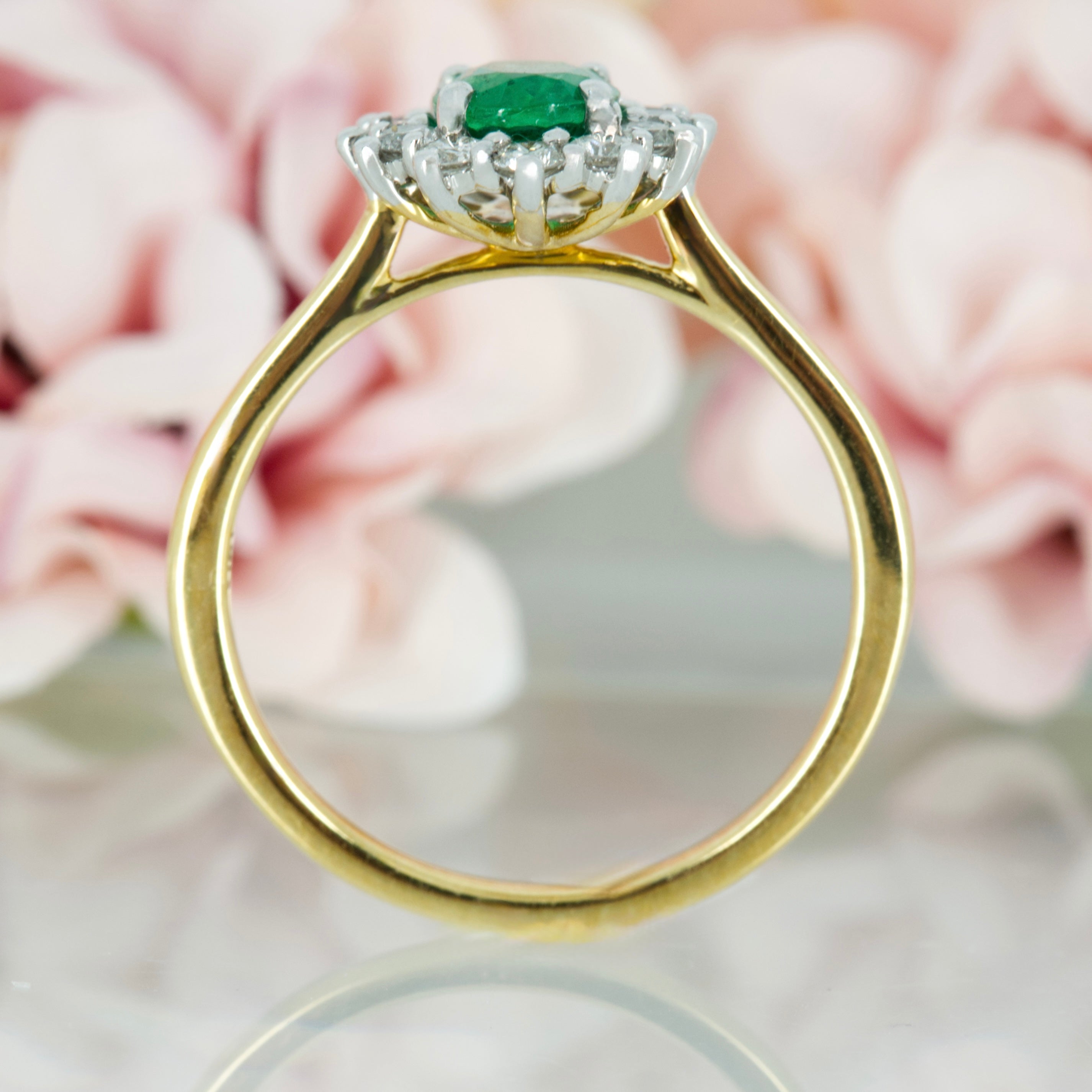 18ct Yellow Gold Oval Cut Emerald & Round Brilliant Cut Diamond Cluster Ring
