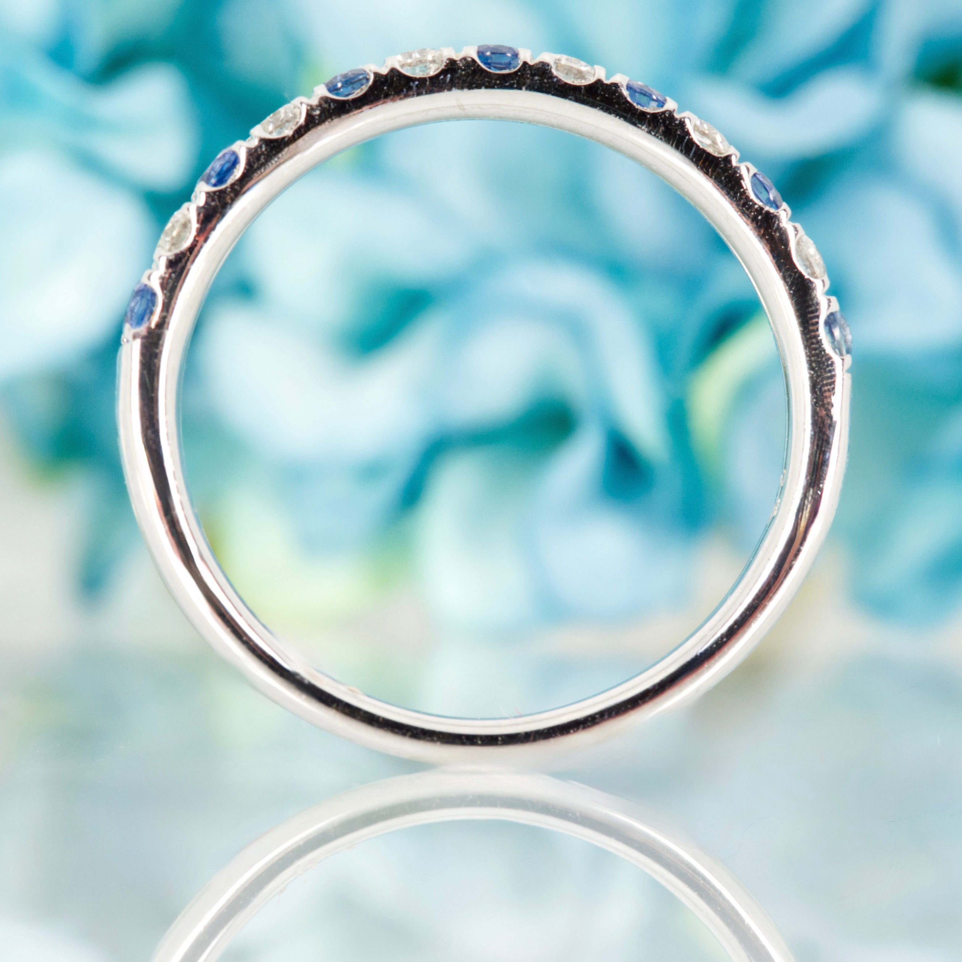 Platinum Round Cut Sapphire & Diamond Claw Set Half Eternity Ring