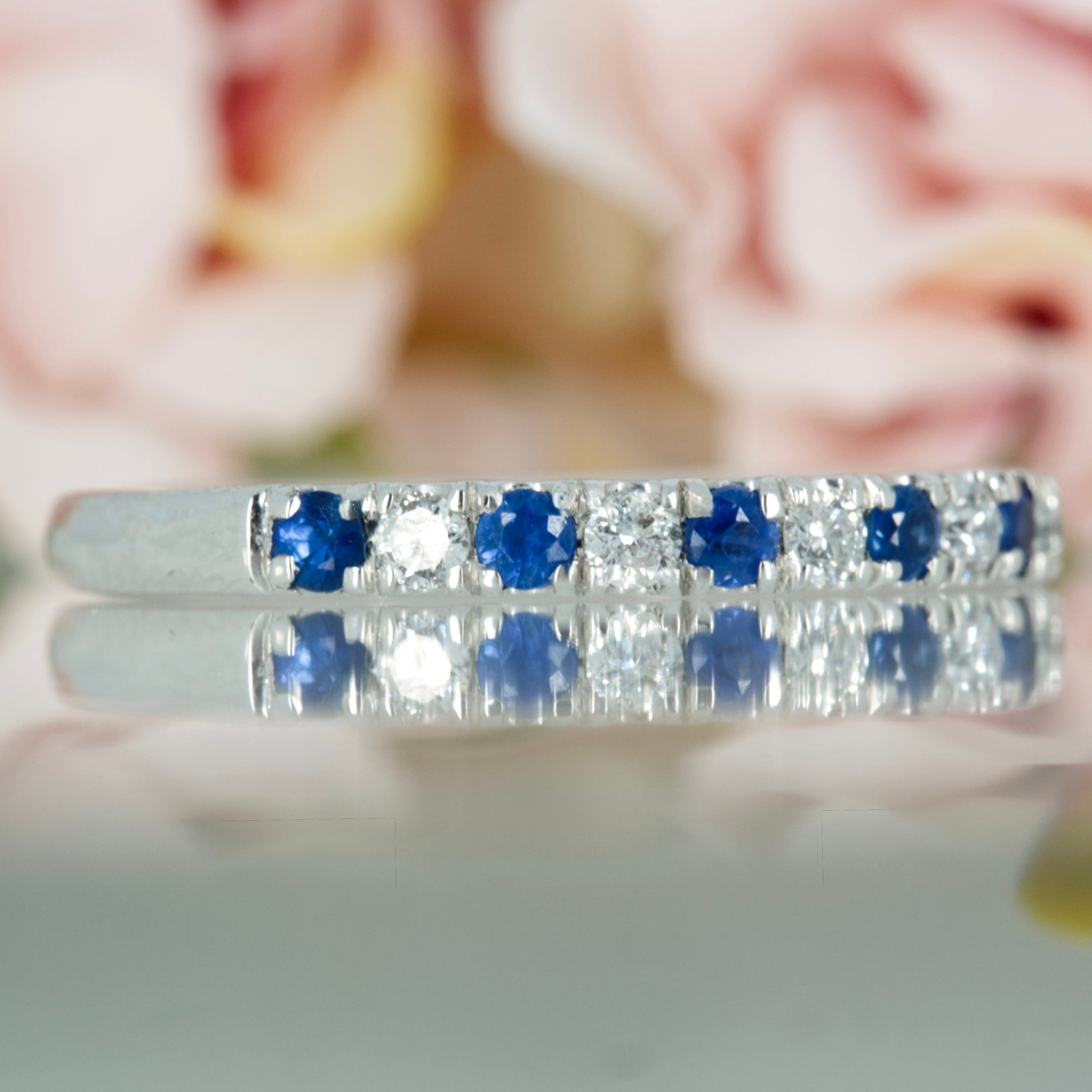 Platinum Round Cut Sapphire & Round Brilliant Cut Diamond Claw Set Half Eternity Ring