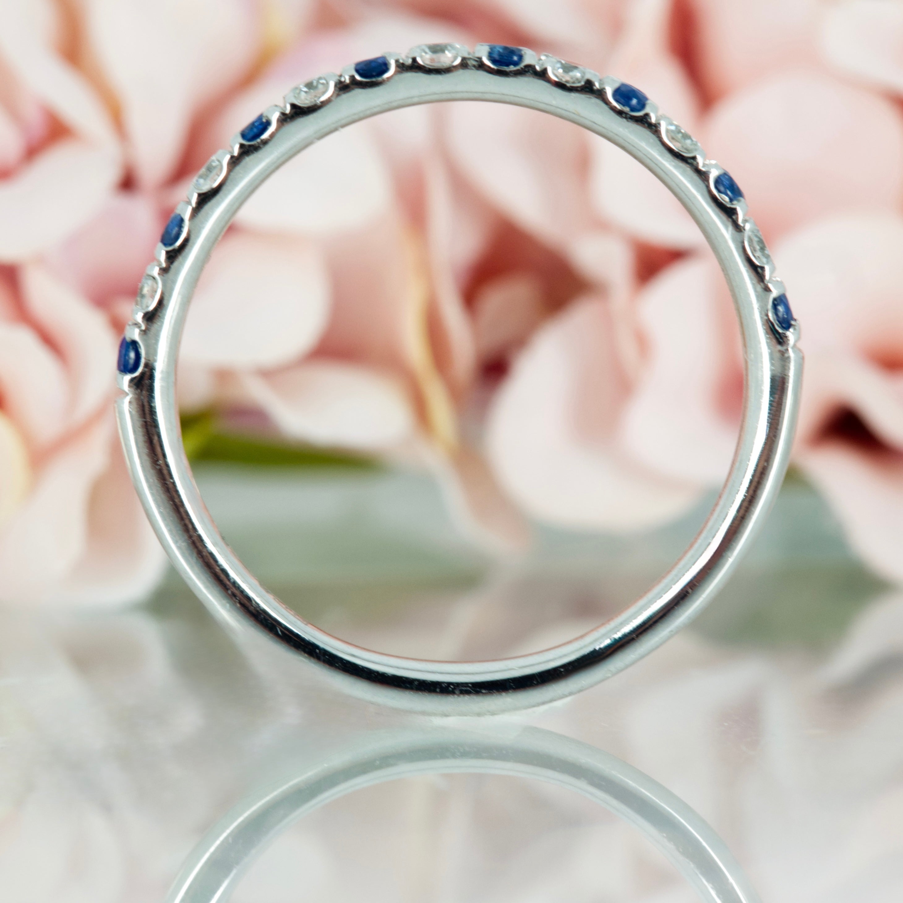 Platinum Round Cut Sapphire & Round Brilliant Cut Diamond Claw Set Half Eternity Ring
