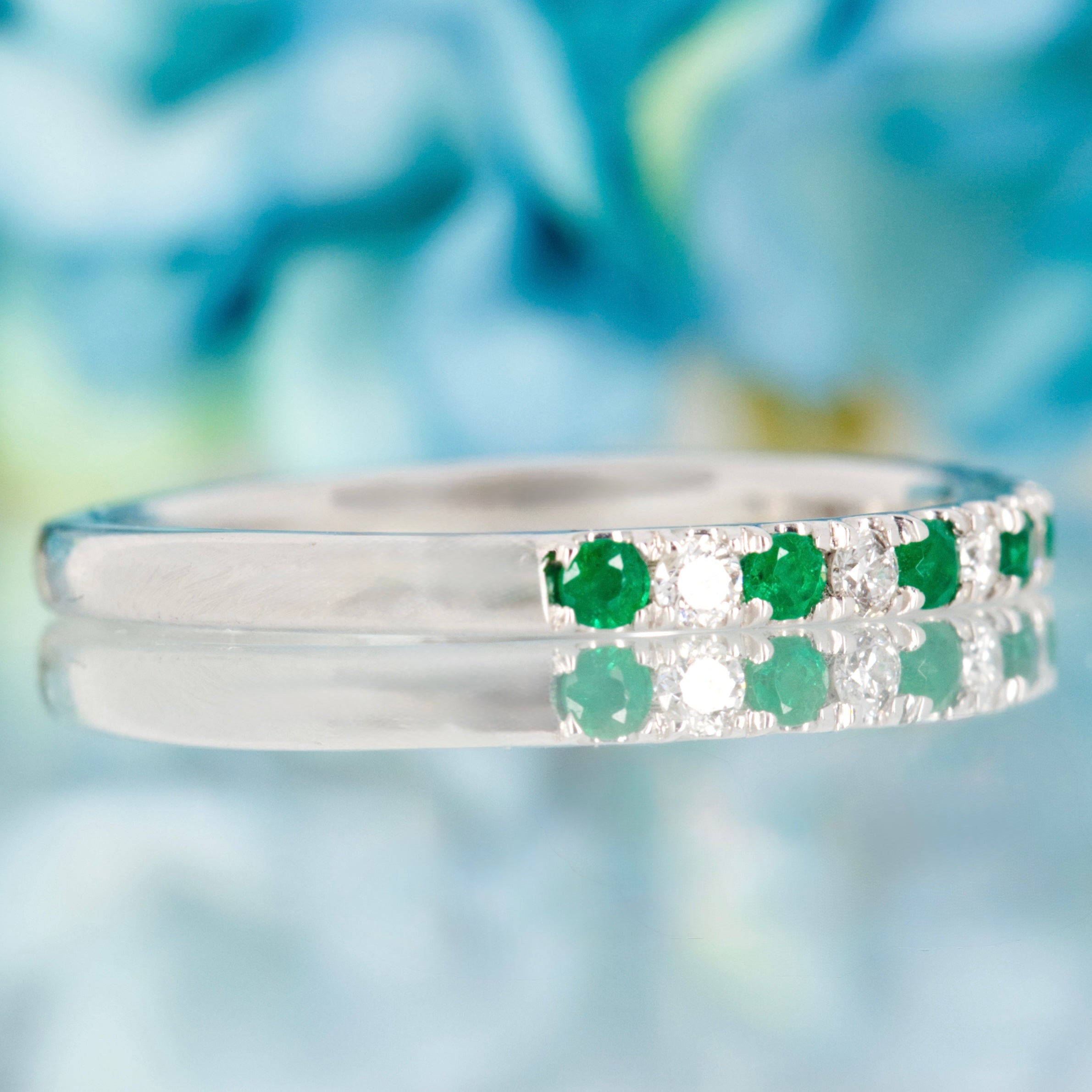 Platinum Round Cut Emerald & Diamond Claw Set Half Eternity Ring