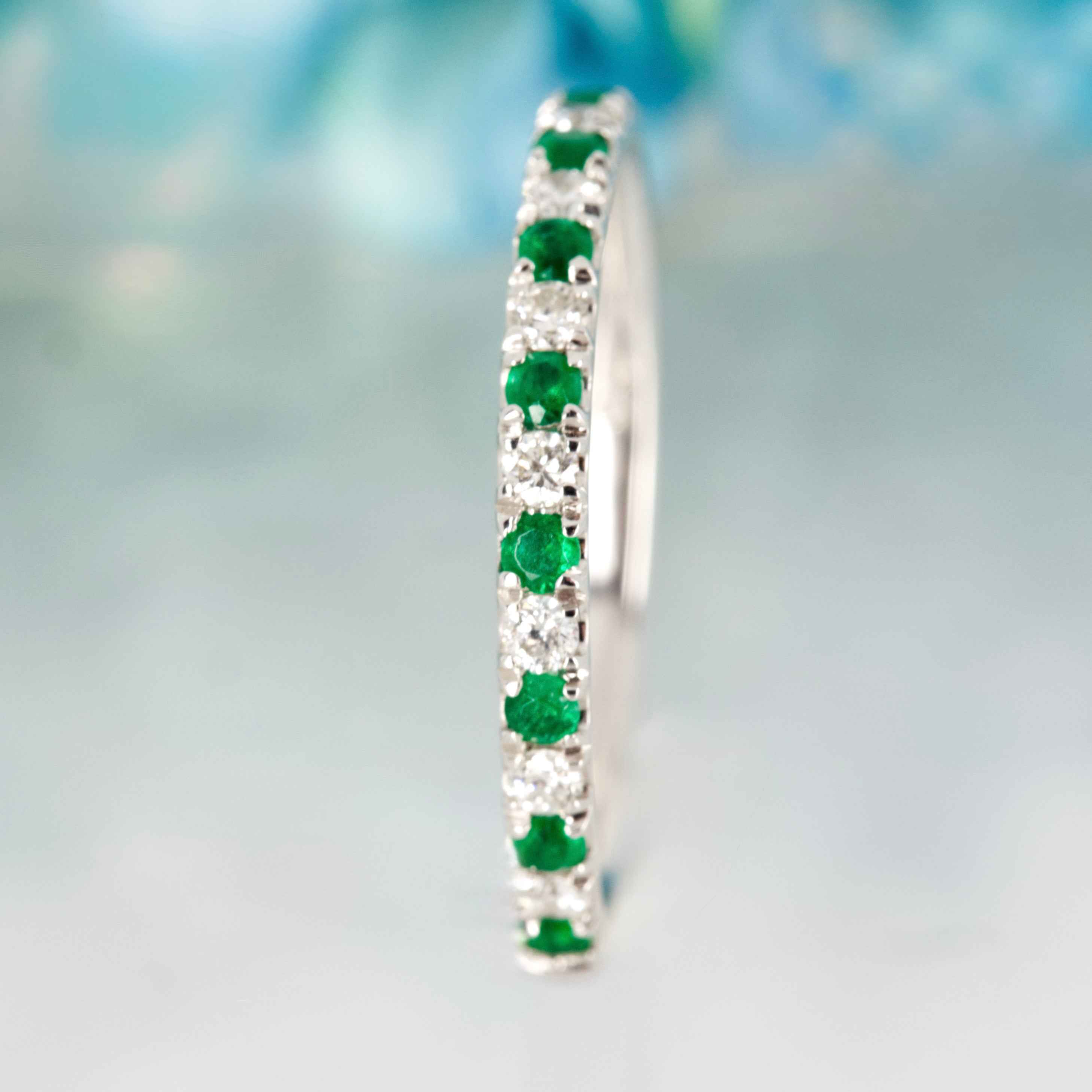 Platinum Round Cut Emerald & Diamond Claw Set Half Eternity Ring