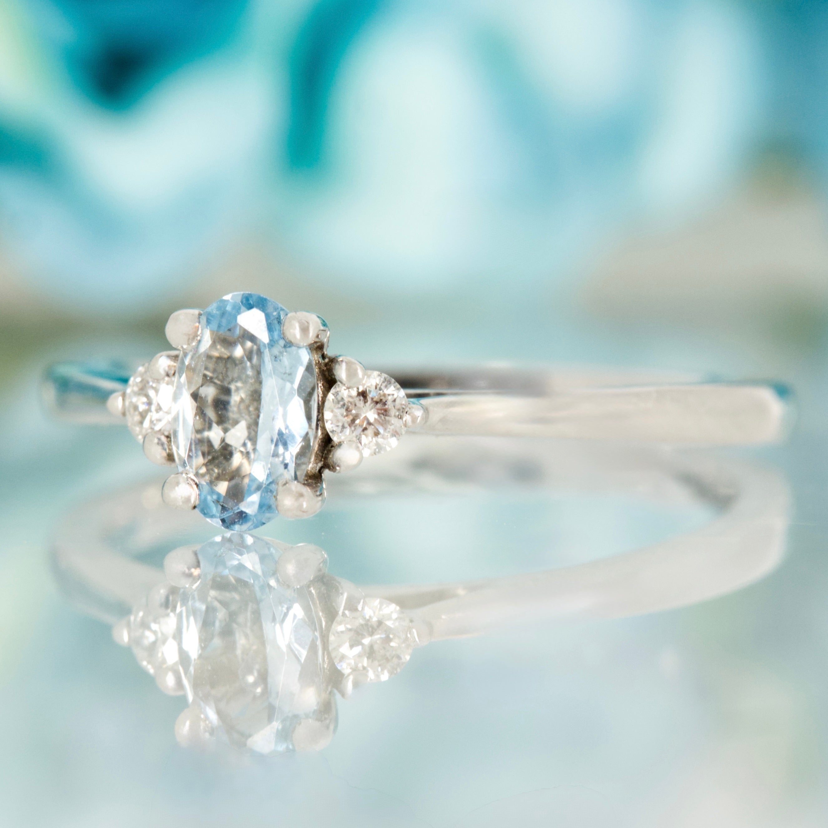 9ct White Gold Oval Cut Aquamarine & Round Brilliant Cut Diamond Trilogy Ring