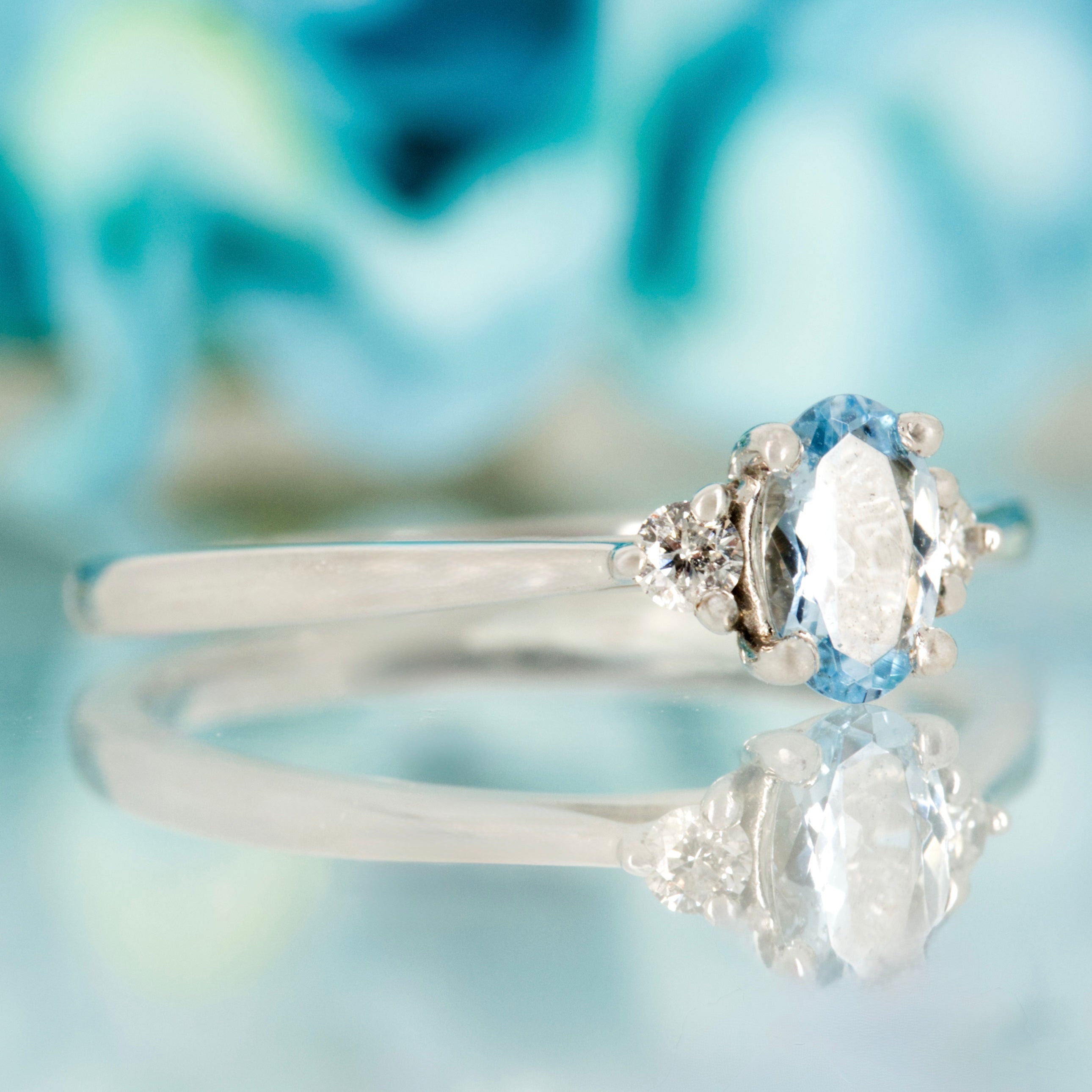 9ct White Gold Oval Cut Aquamarine & Round Brilliant Cut Diamond Trilogy Ring
