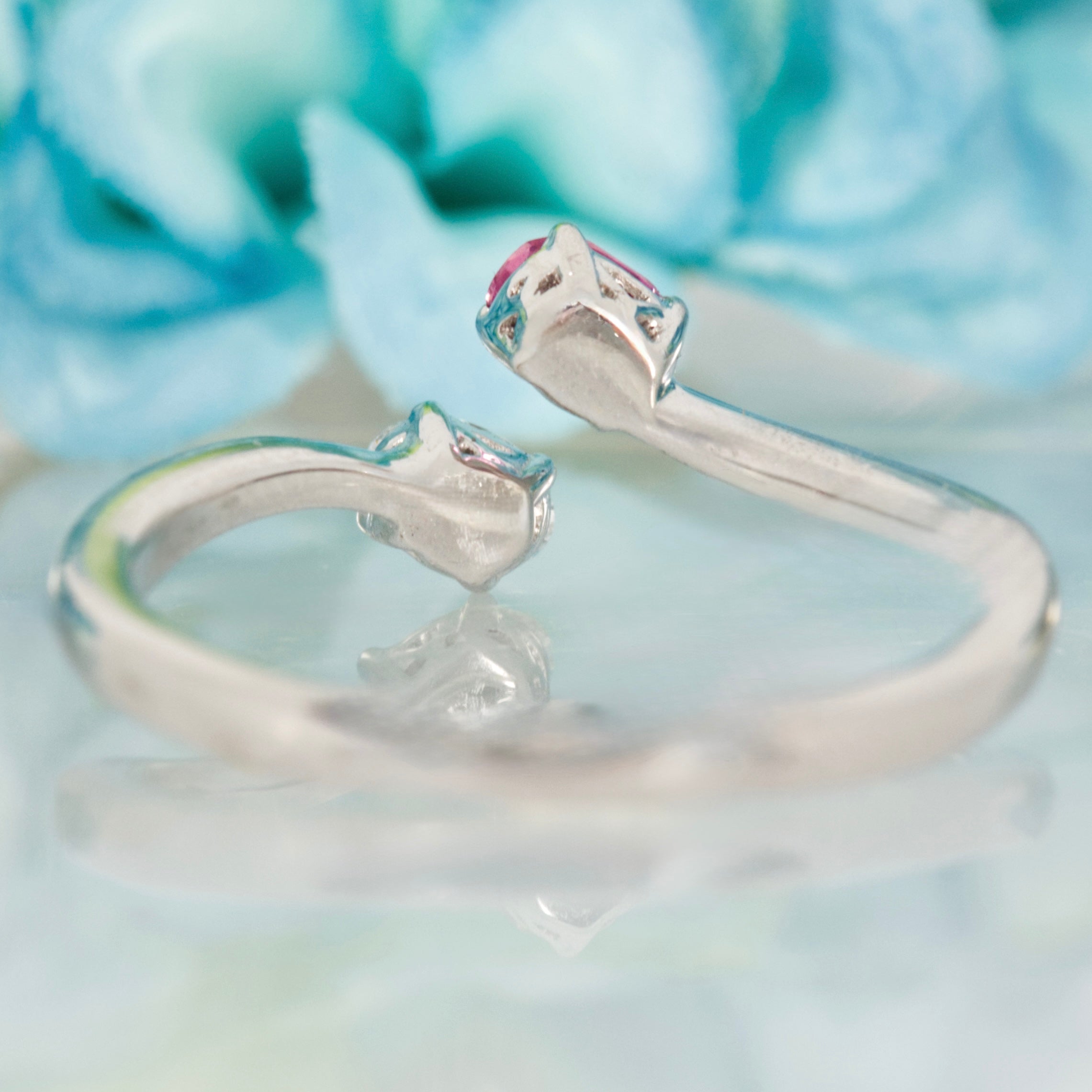 Platinum Oval Cut Pink Sapphire & Diamond Crossover Ring