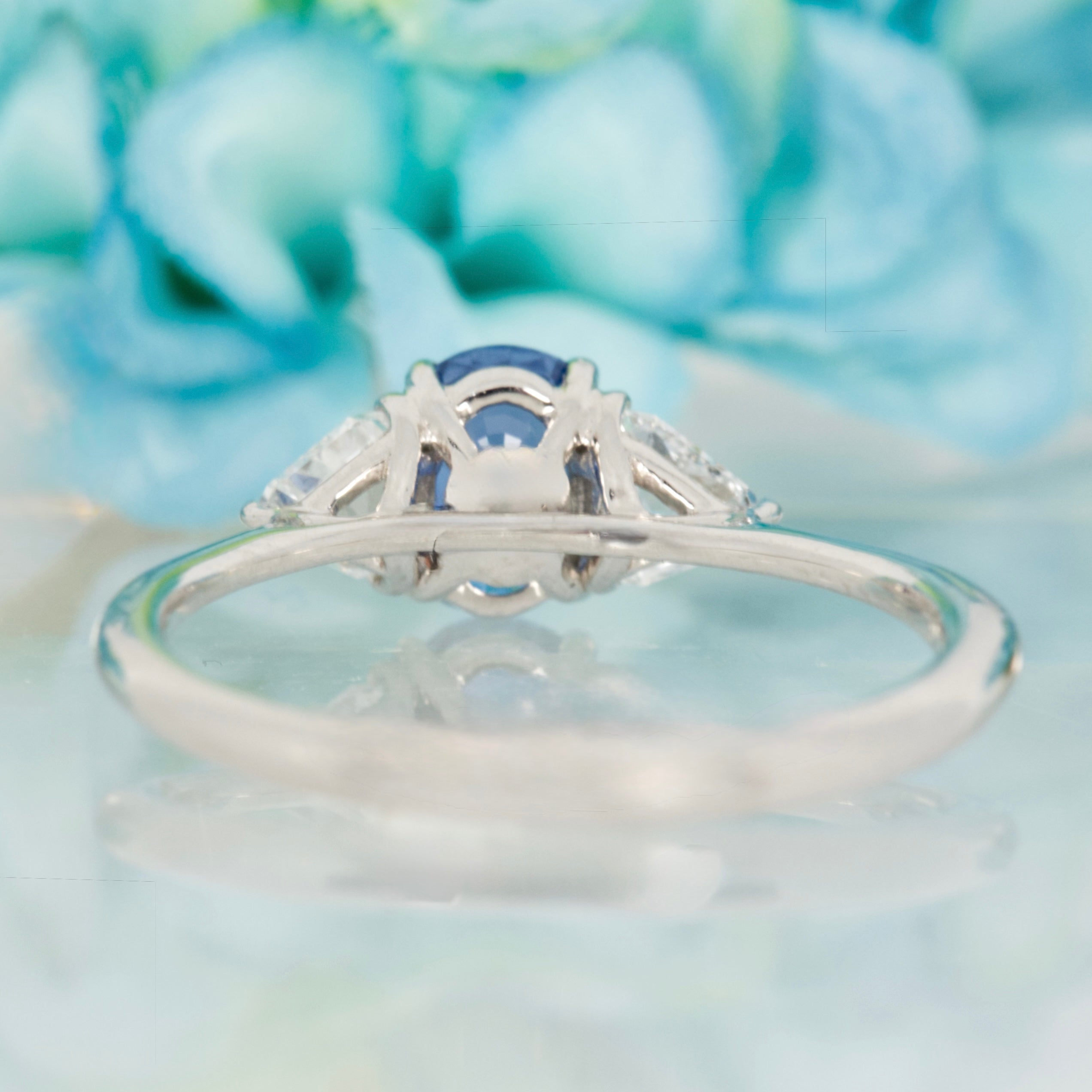 Platinum Oval Cut Sapphire & Trilliant Cut Diamond Trilogy Ring