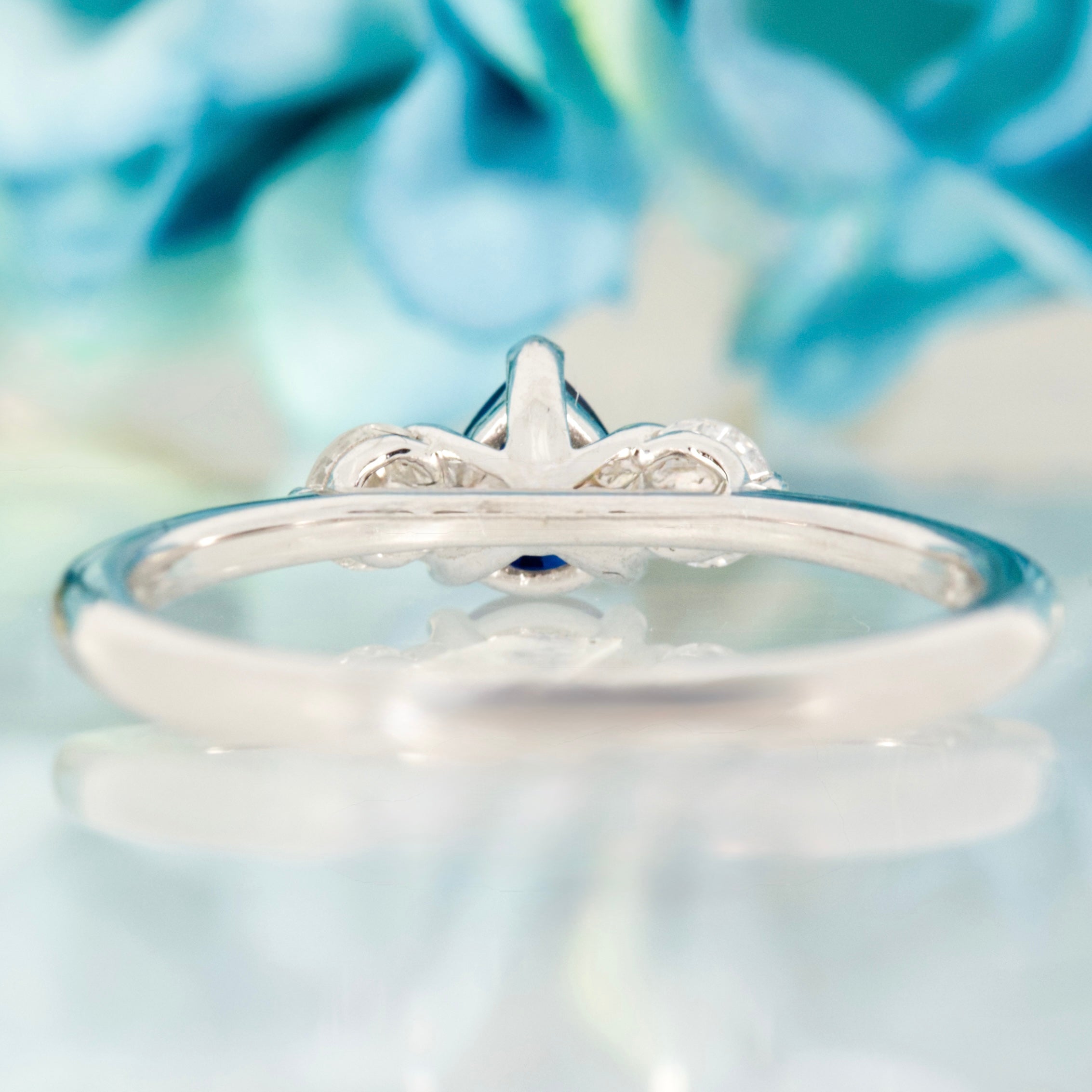 Platinum Pear Cut Sapphire & Round Brilliant Cut Diamond Trilogy Ring